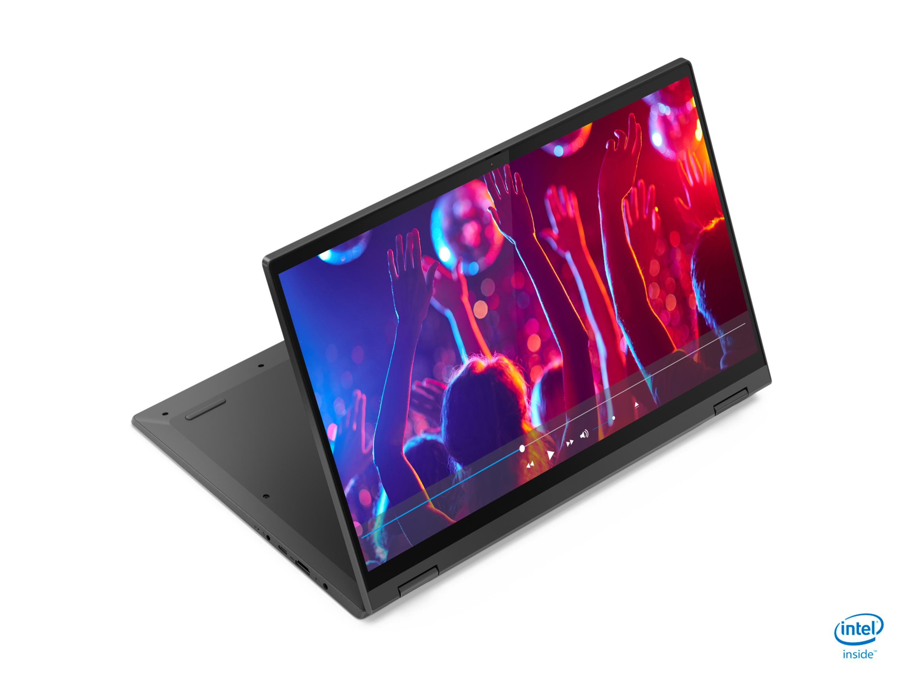 Laptop zeigt eine Partyszene mit tanzenden Menschen. Intel Inside Logo rechts unten.