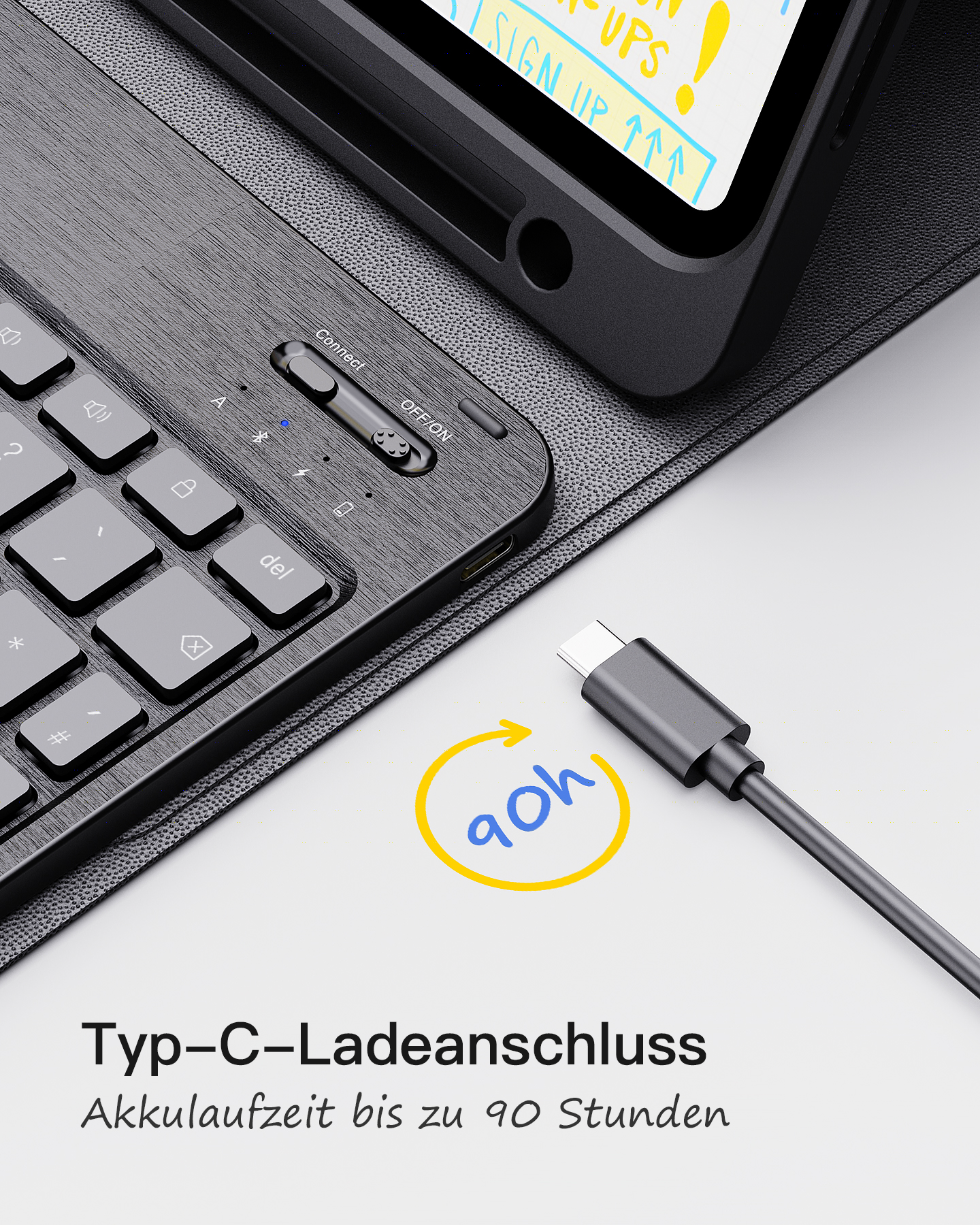 Nahaufnahme einer Tastatur und eines Tablets mit einem Ladekabel. Text sagt 90h.