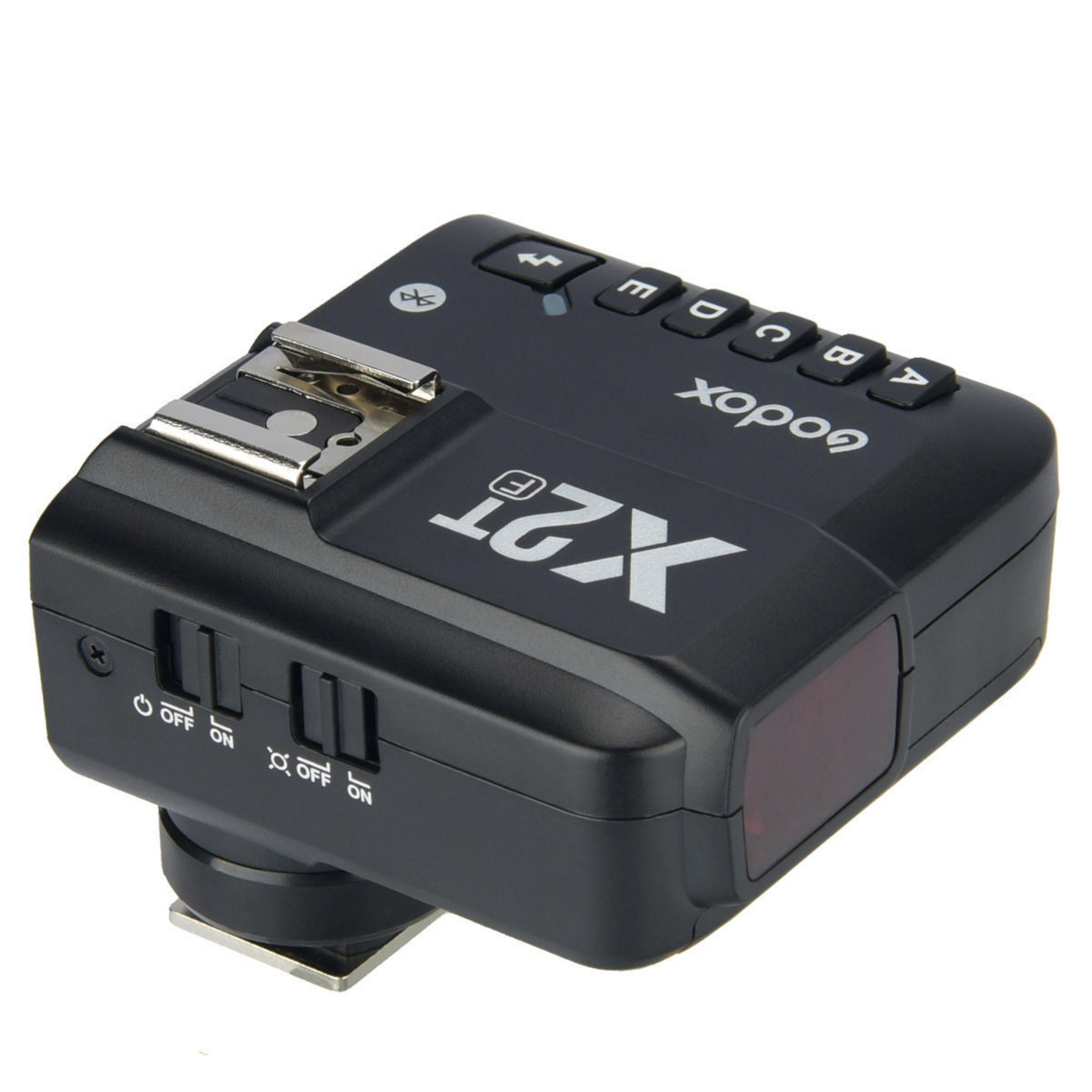 Trigger flash Godox X2T-F nero. Pulsanti e controlli visibili sul dispositivo.