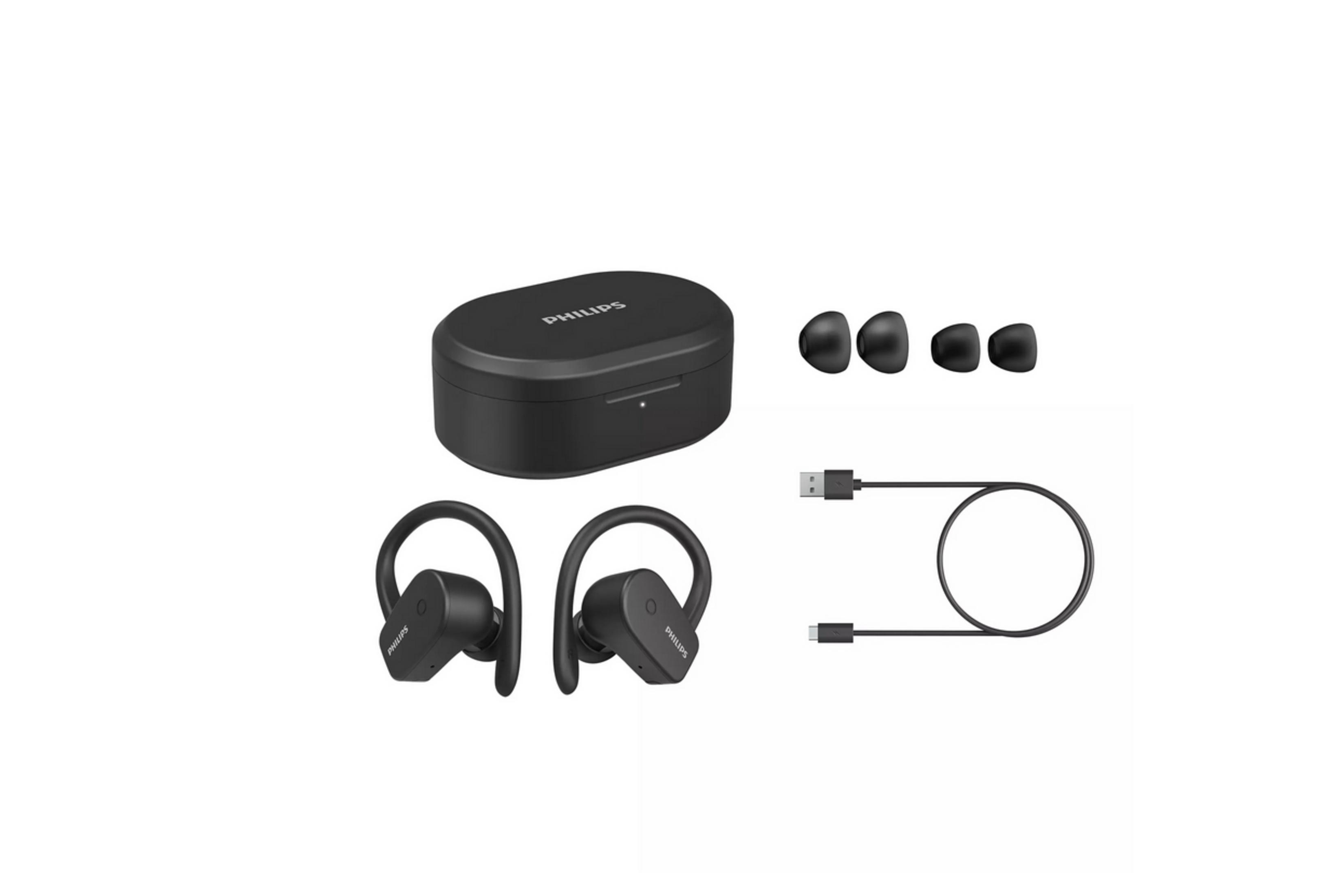 Czarne bezprzewodowe słuchawki, etui ładujące, dodatkowe wkładki douszne i kabel USB na białym tle.