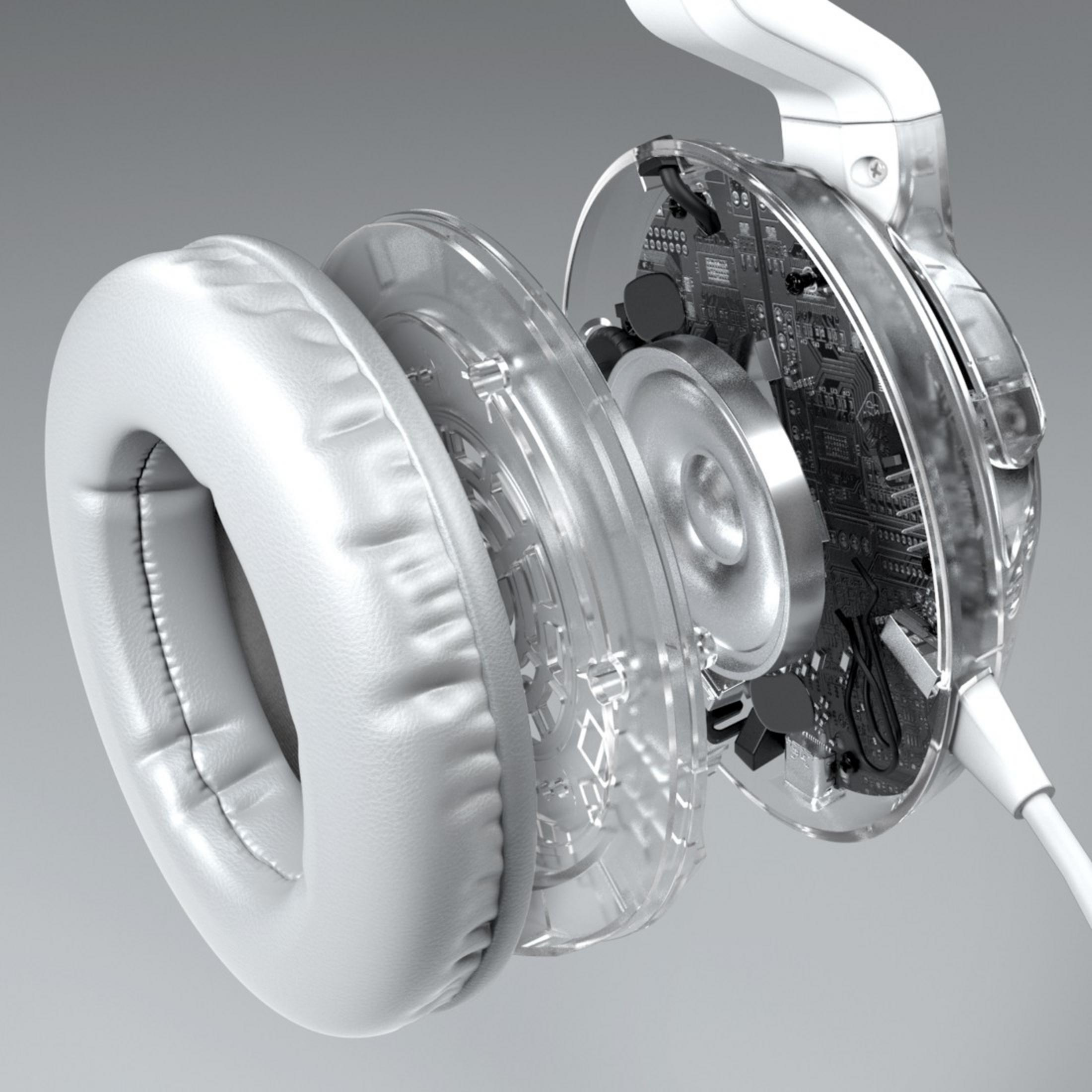 Przekrój białych słuchawek. Widoczne są elementy wewnętrzne.