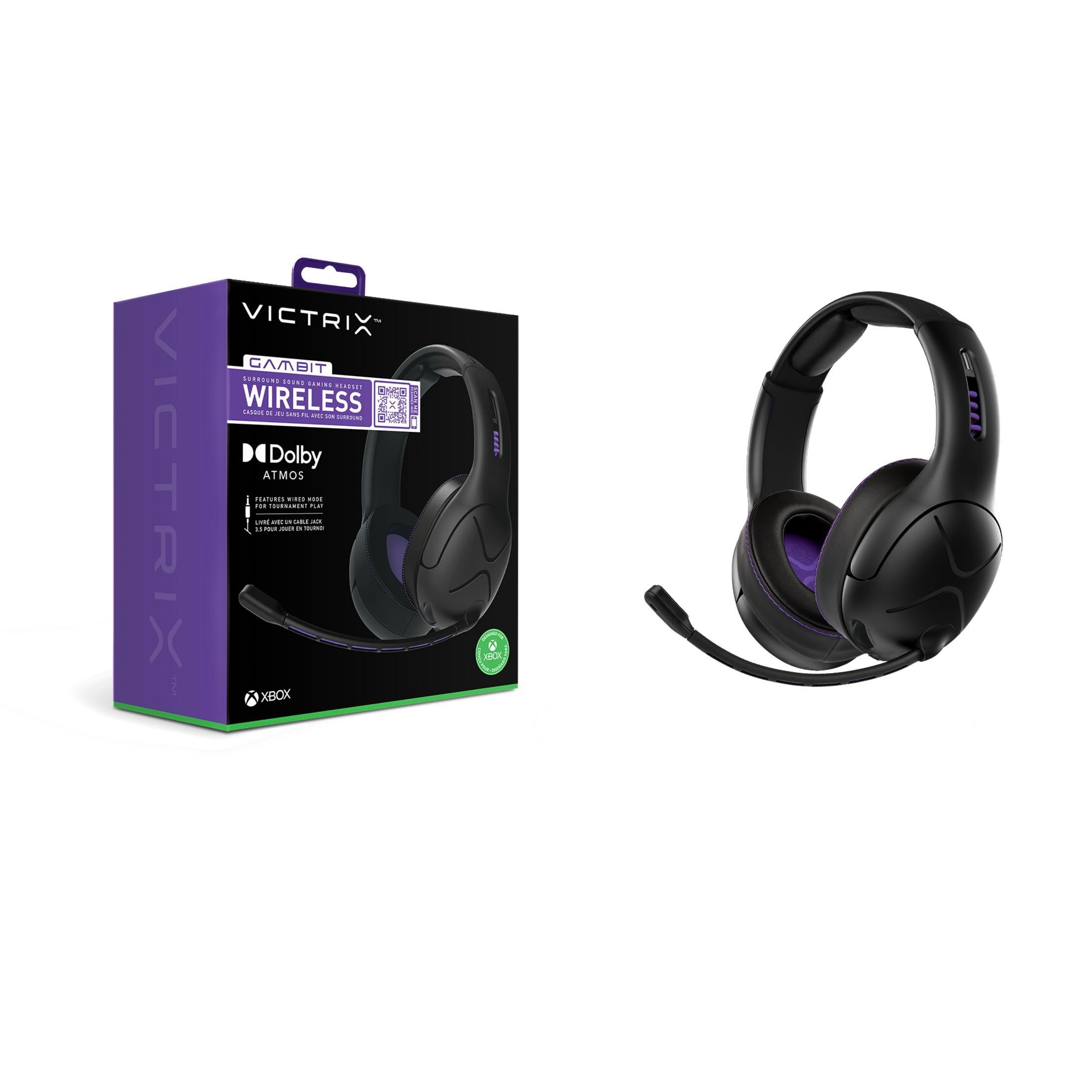 Słuchawki i pudełko. Czarne słuchawki po prawej stronie i pudełko Victrix po lewej.