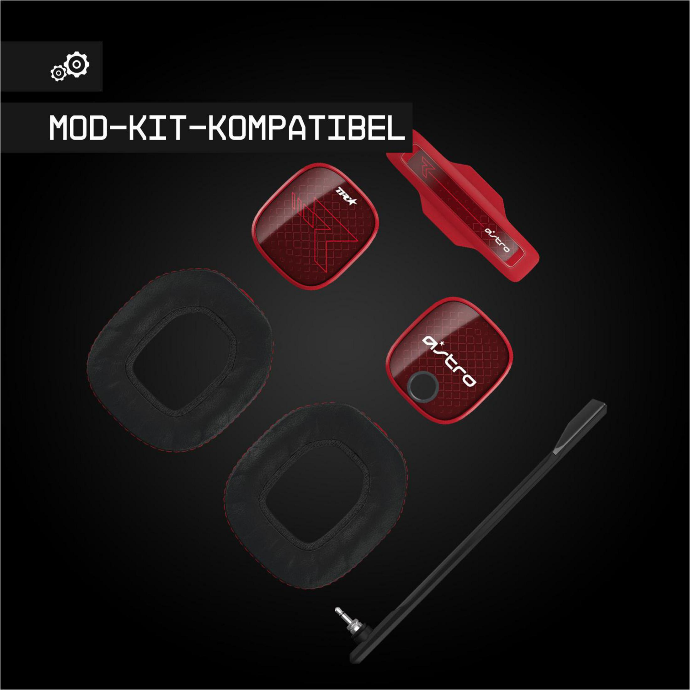 Rote Headset-Teile mit schwarzen Ohrmuscheln und Mikrofon, auf schwarzer Oberfläche.