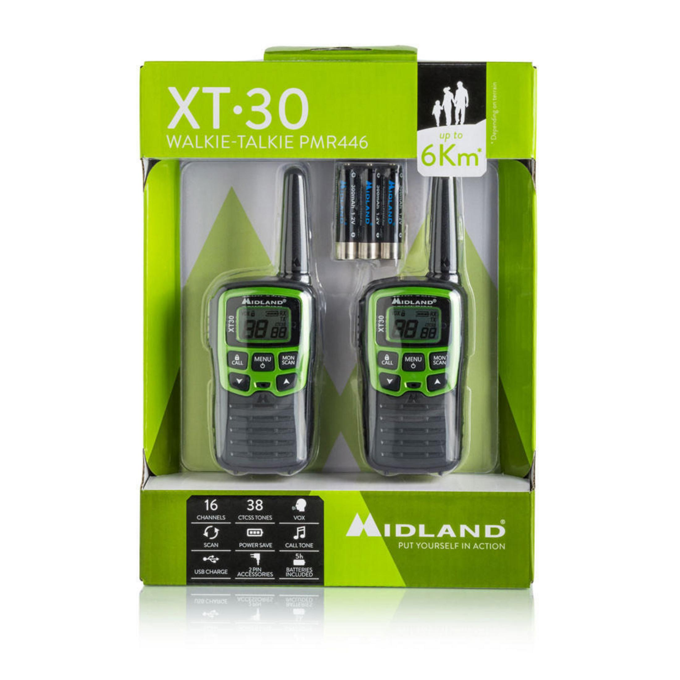 Schachtel mit zwei grün-schwarzen Walkie-Talkies, Batterien und Midland-Branding. Text zeigt 6KM Reichweite.