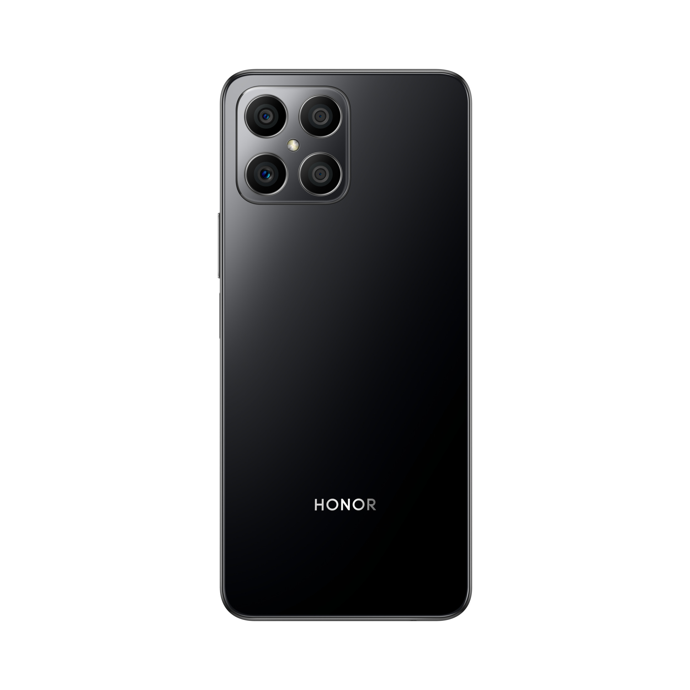Parte trasera de smartphone negro. Cuatro lentes de cámara arriba, logo Honor abajo.
