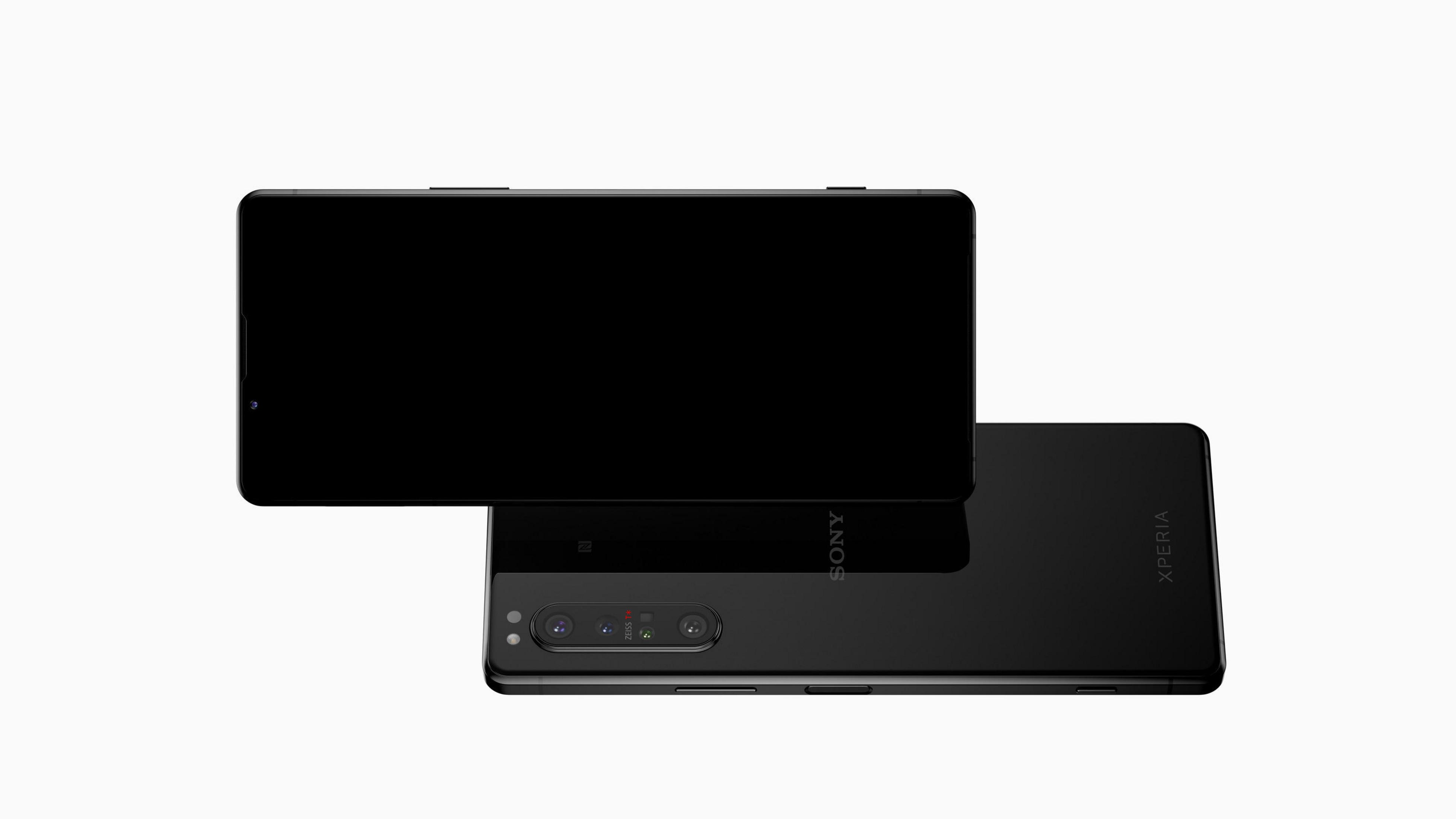 Zwei schwarze Smartphones, eines oben auf dem anderen. Weißer Hintergrund.