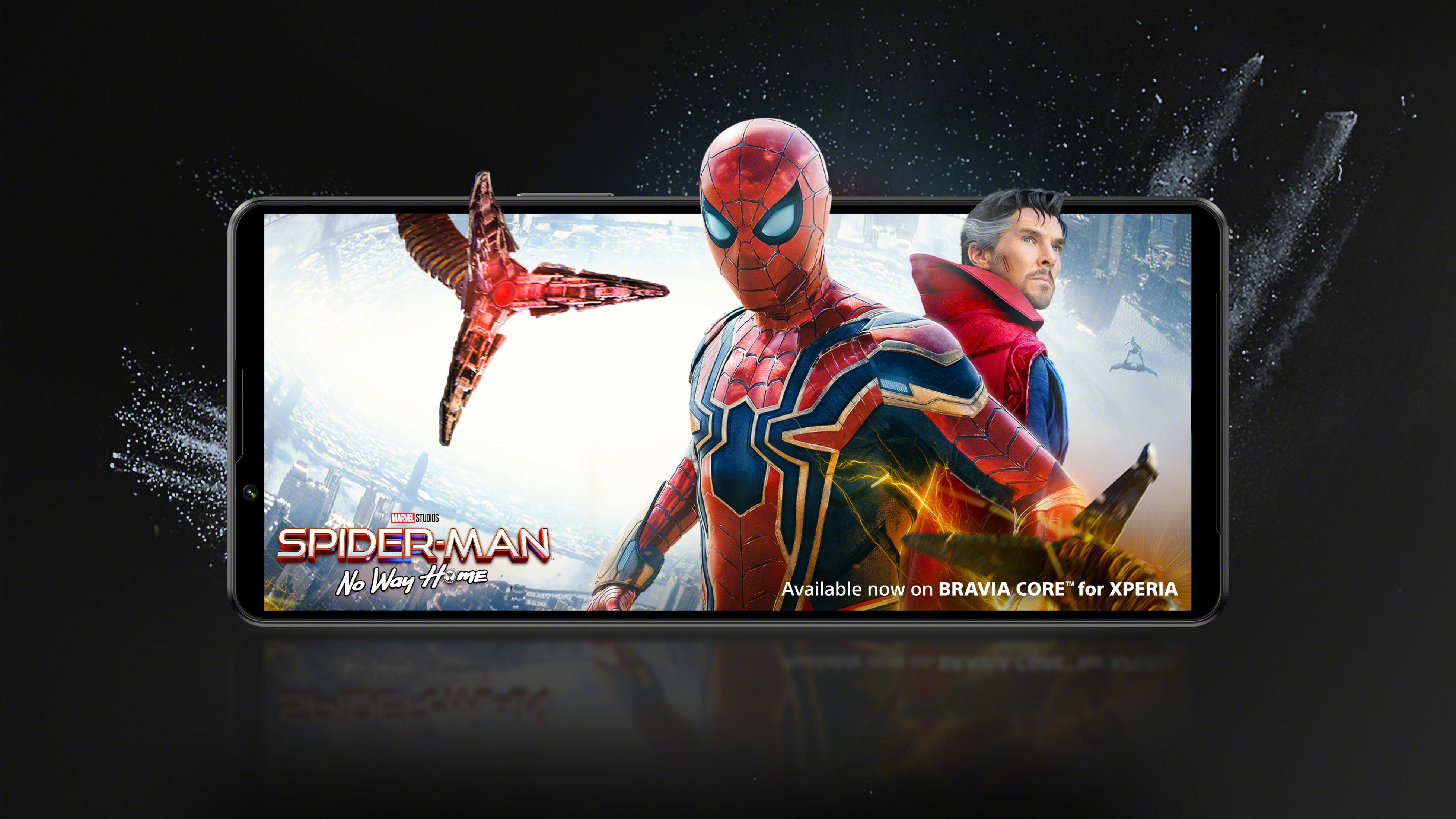 Telefon wyświetlający obraz Spider-Mana z innymi postaciami.