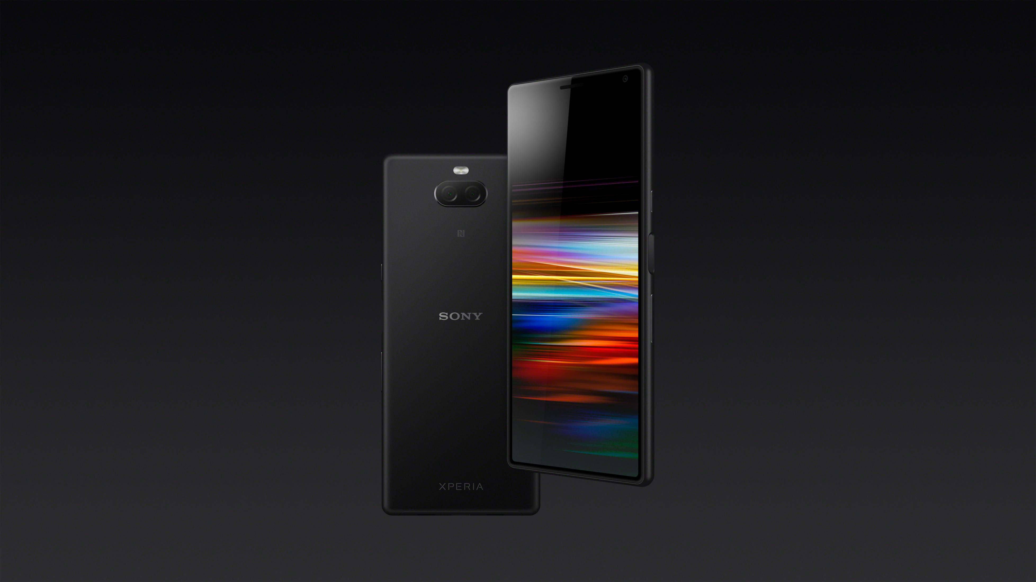 Czarny telefon Sony Xperia na czarnym tle. Ekran wyświetla kolorowy wzór.