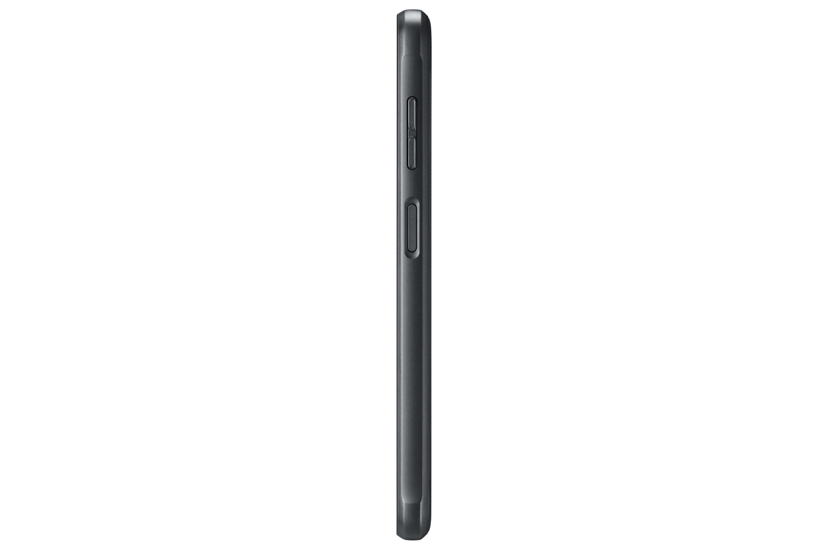 Vue latérale d'un téléphone noir avec boutons sur fond blanc.