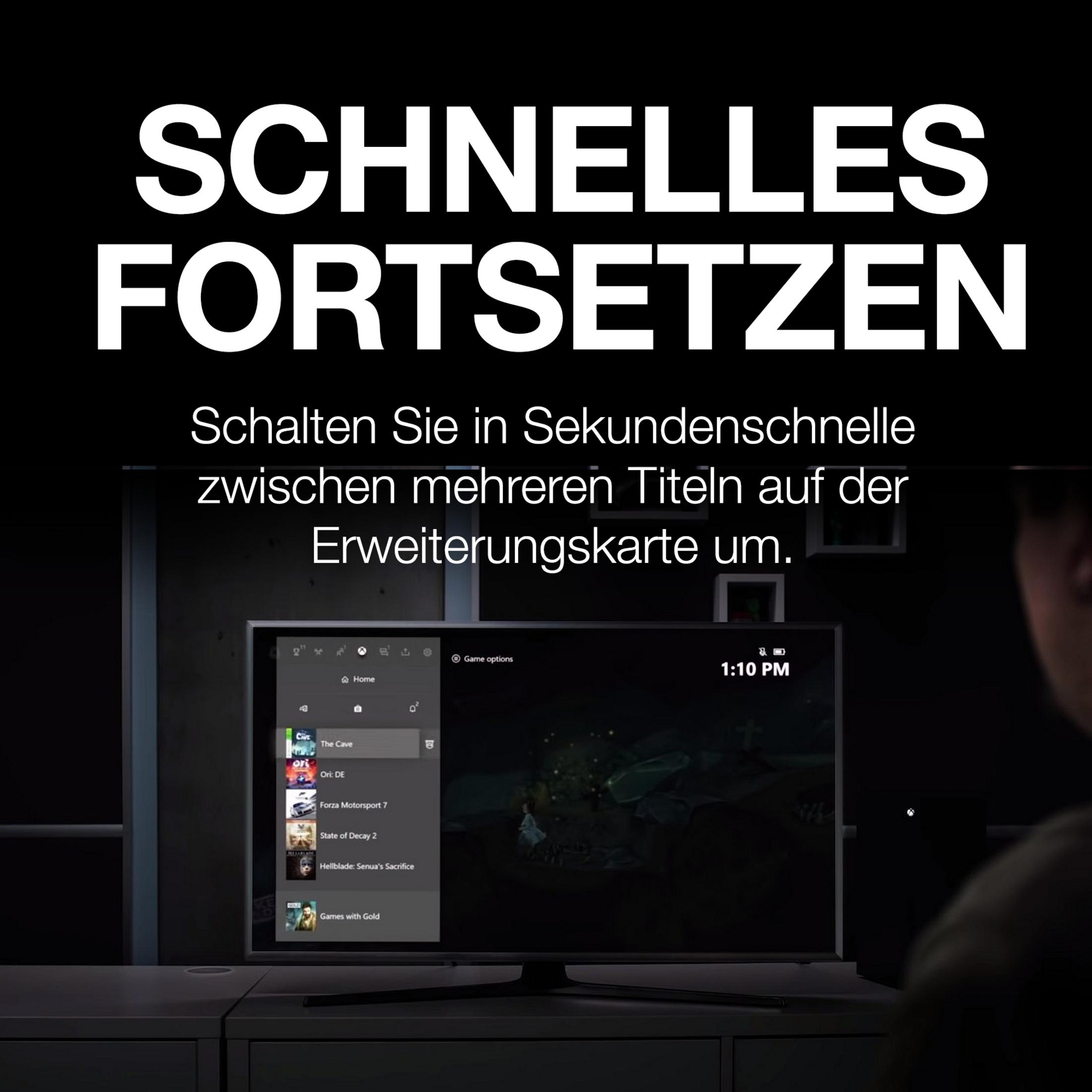 Ekran telewizora z tekstem w języku niemieckim. Wyświetla menu gry z opcjami. Widoczne ramię.