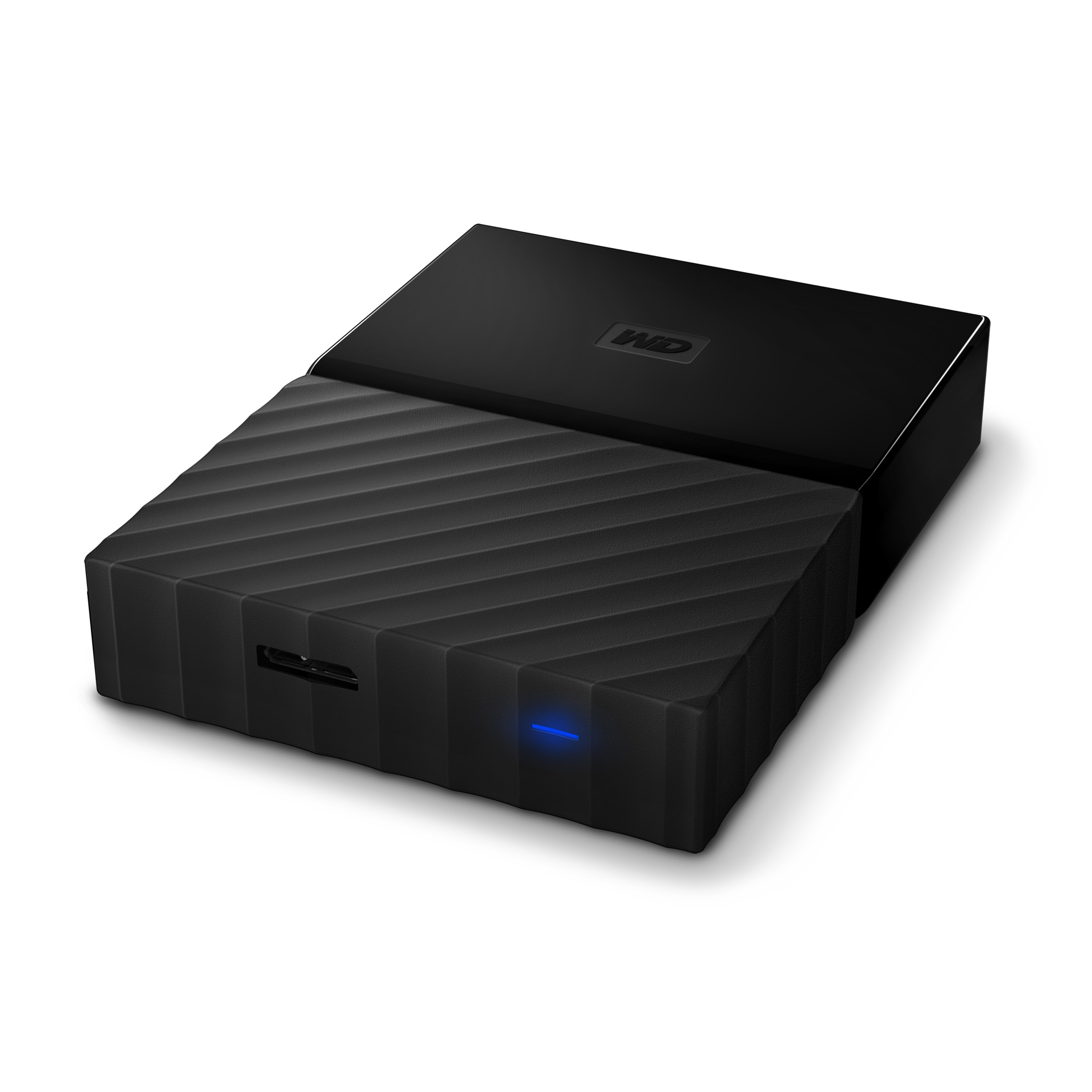 Disco duro externo negro con superficie texturizada, puerto USB e indicador LED azul.