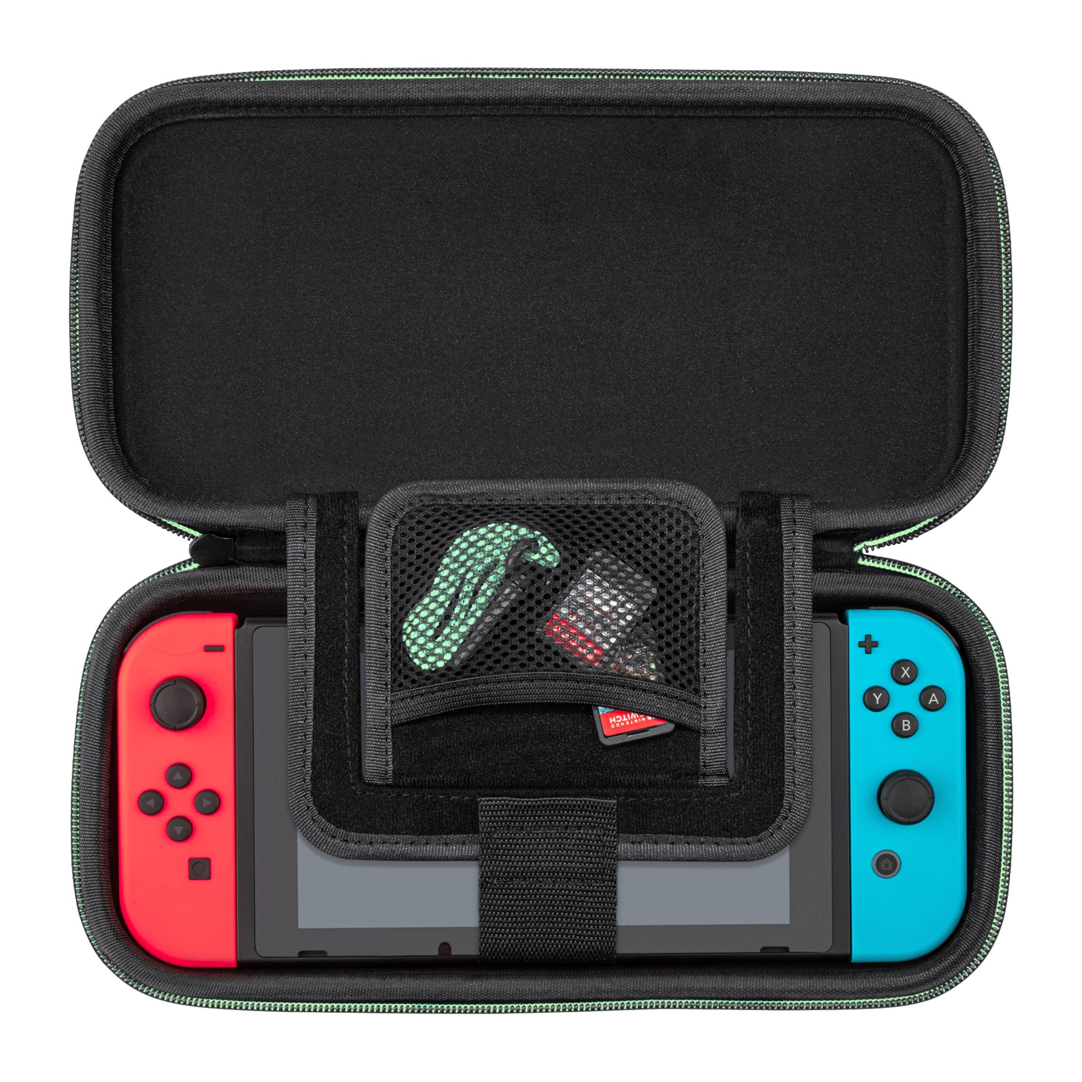 Czarny i zielony futerał, otwarty, z Nintendo Switch i akcesoriami w środku.