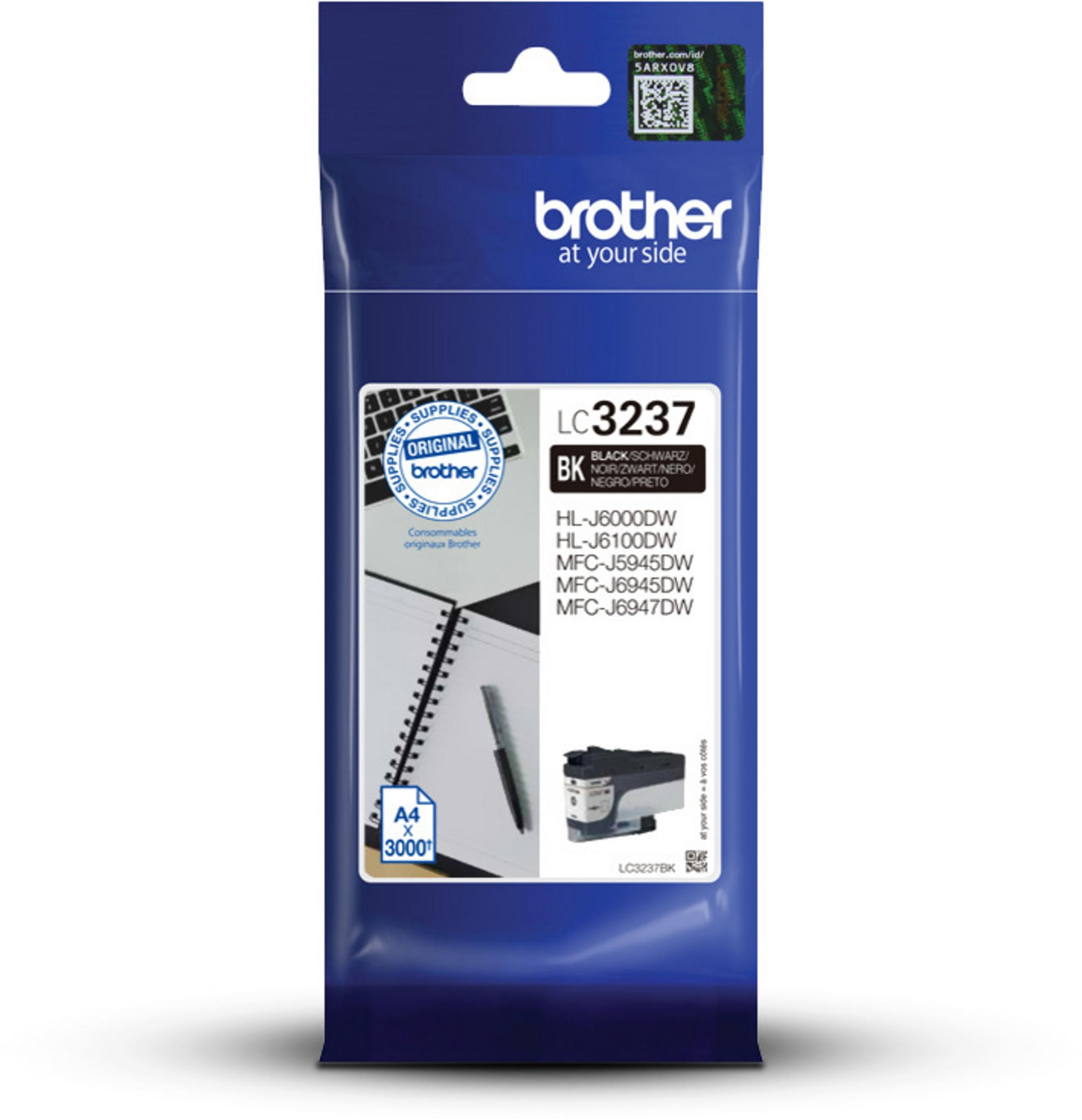 Brother LC3237 ink cartridge packaging with a pen and notepad.