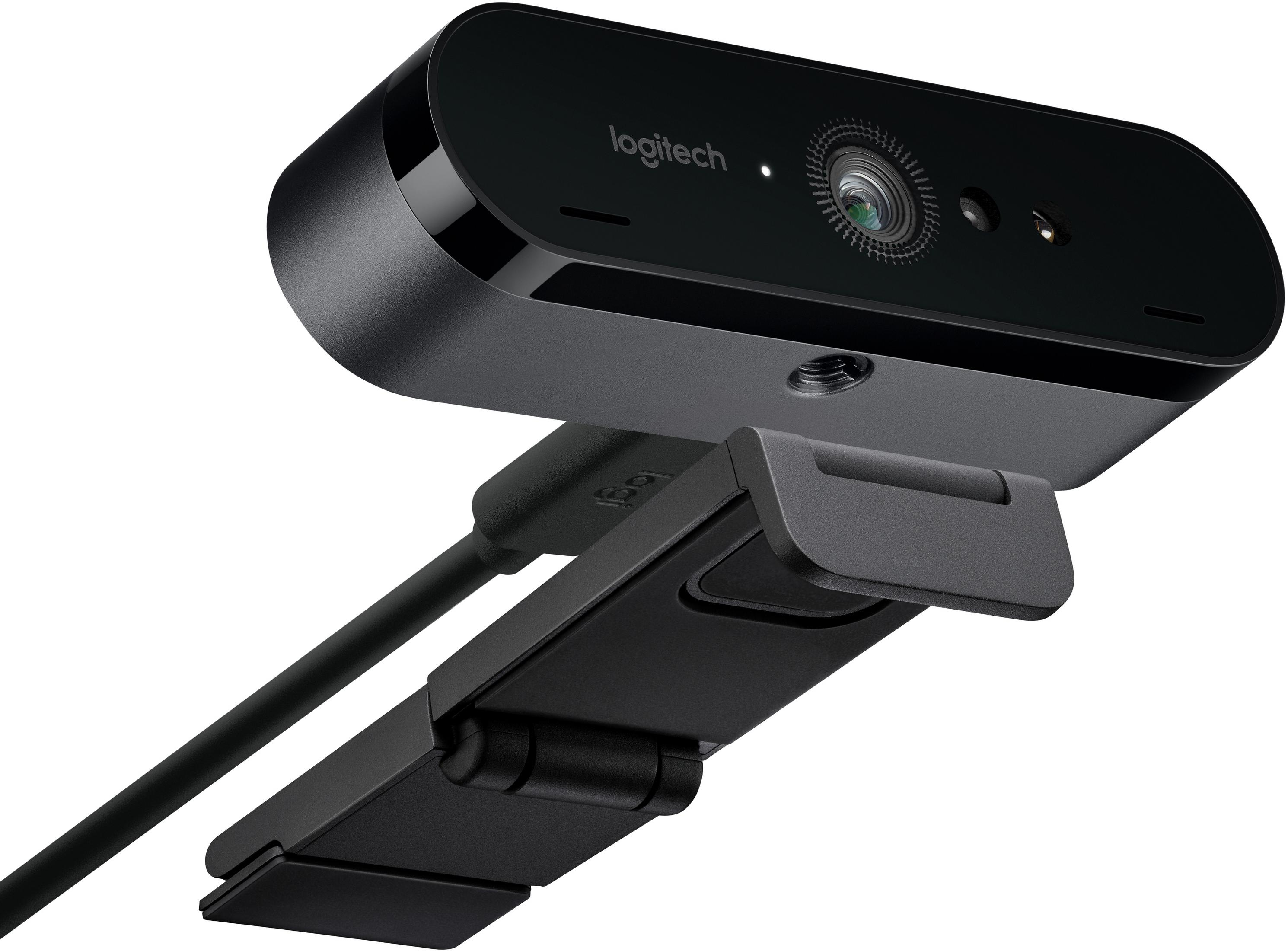 Czarna kamera internetowa Logitech. Ma mały obiektyw i czarną podstawę.