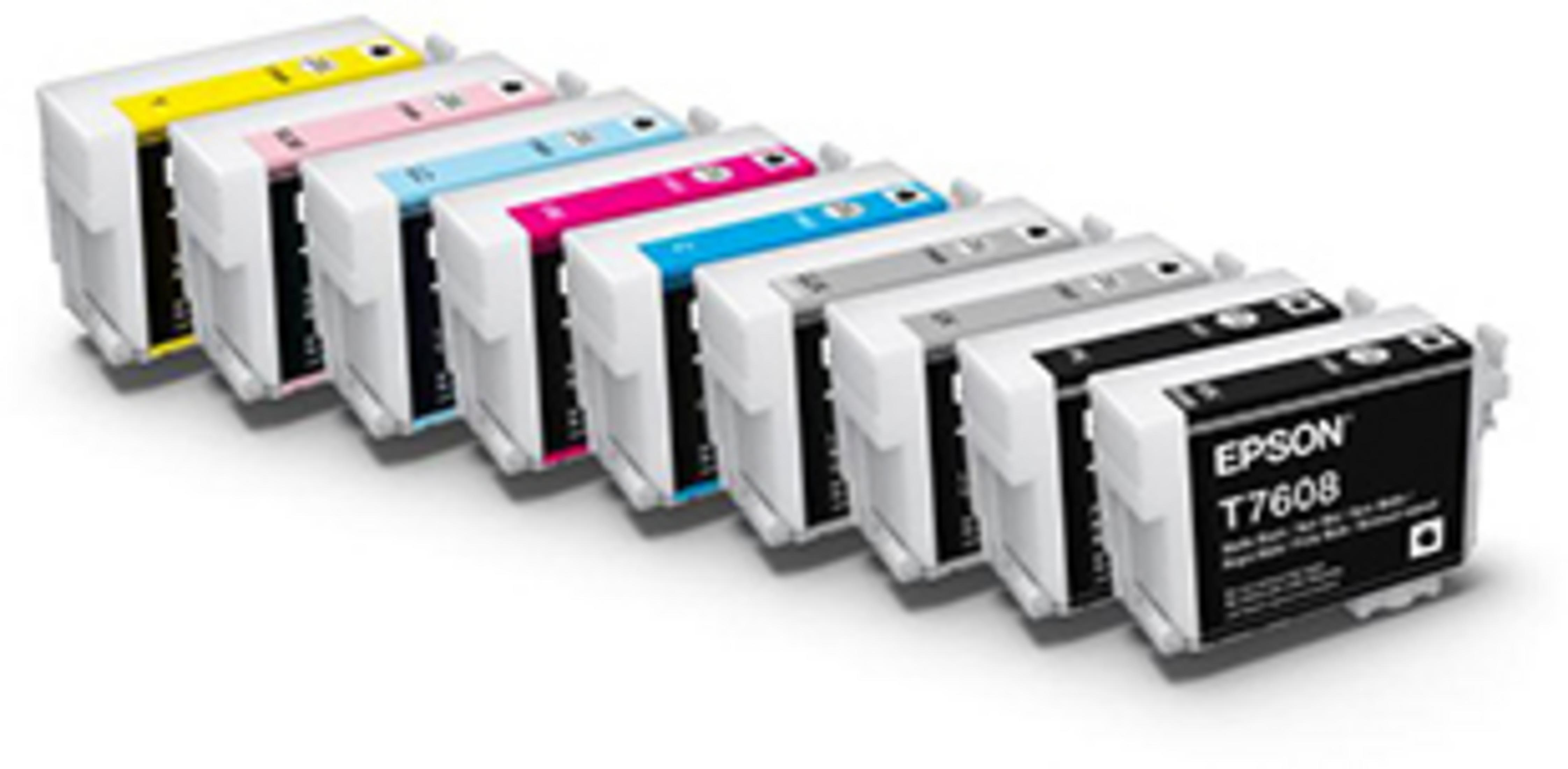 Wkłady atramentowe w rzędzie. Kolory to żółty, różowy, jasnoniebieski i czarny. Tło jest białe.