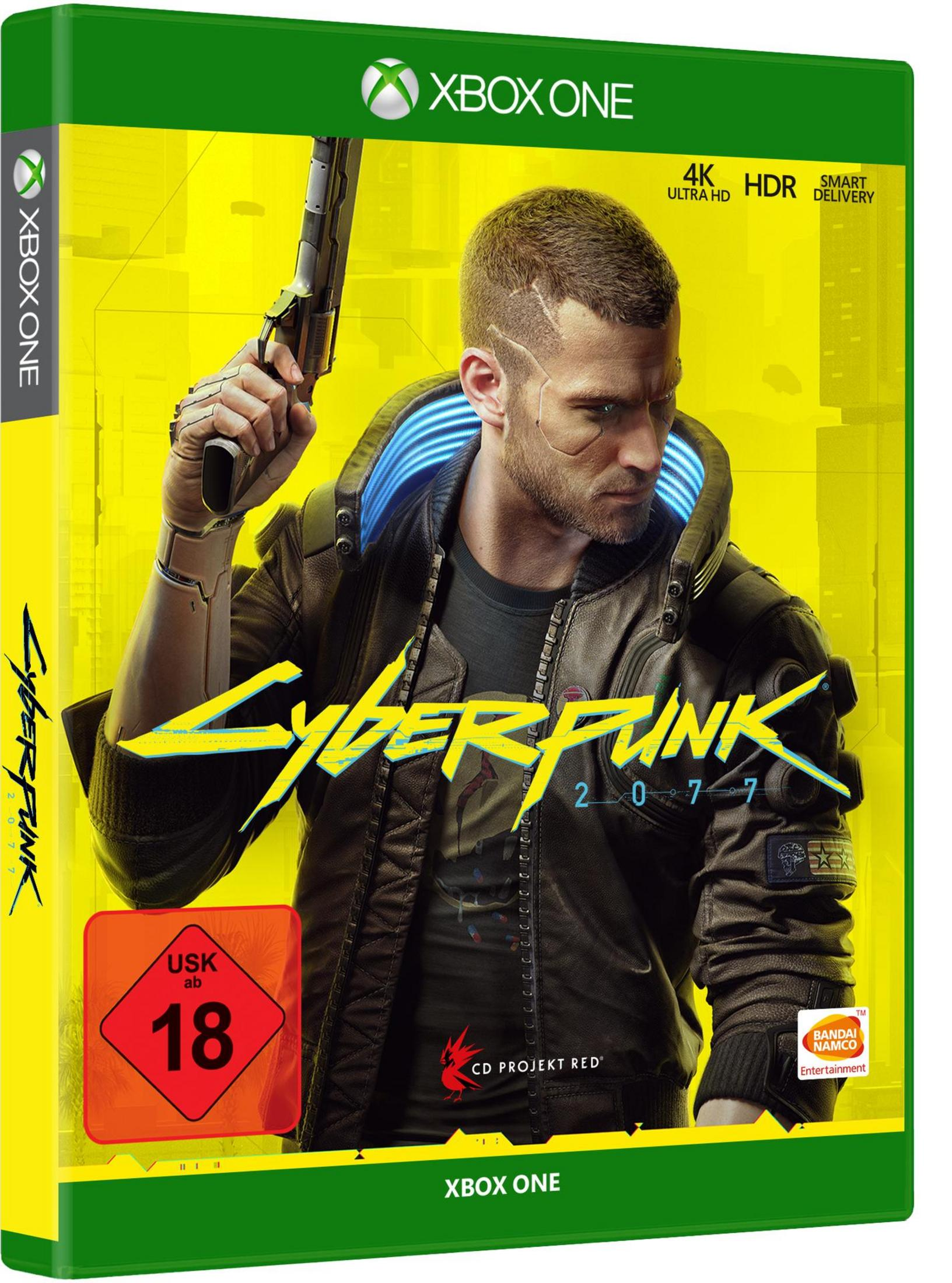 Okładka gry Cyberpunk 2077 na Xbox One. Mężczyzna z bronią w żółtym mieście.