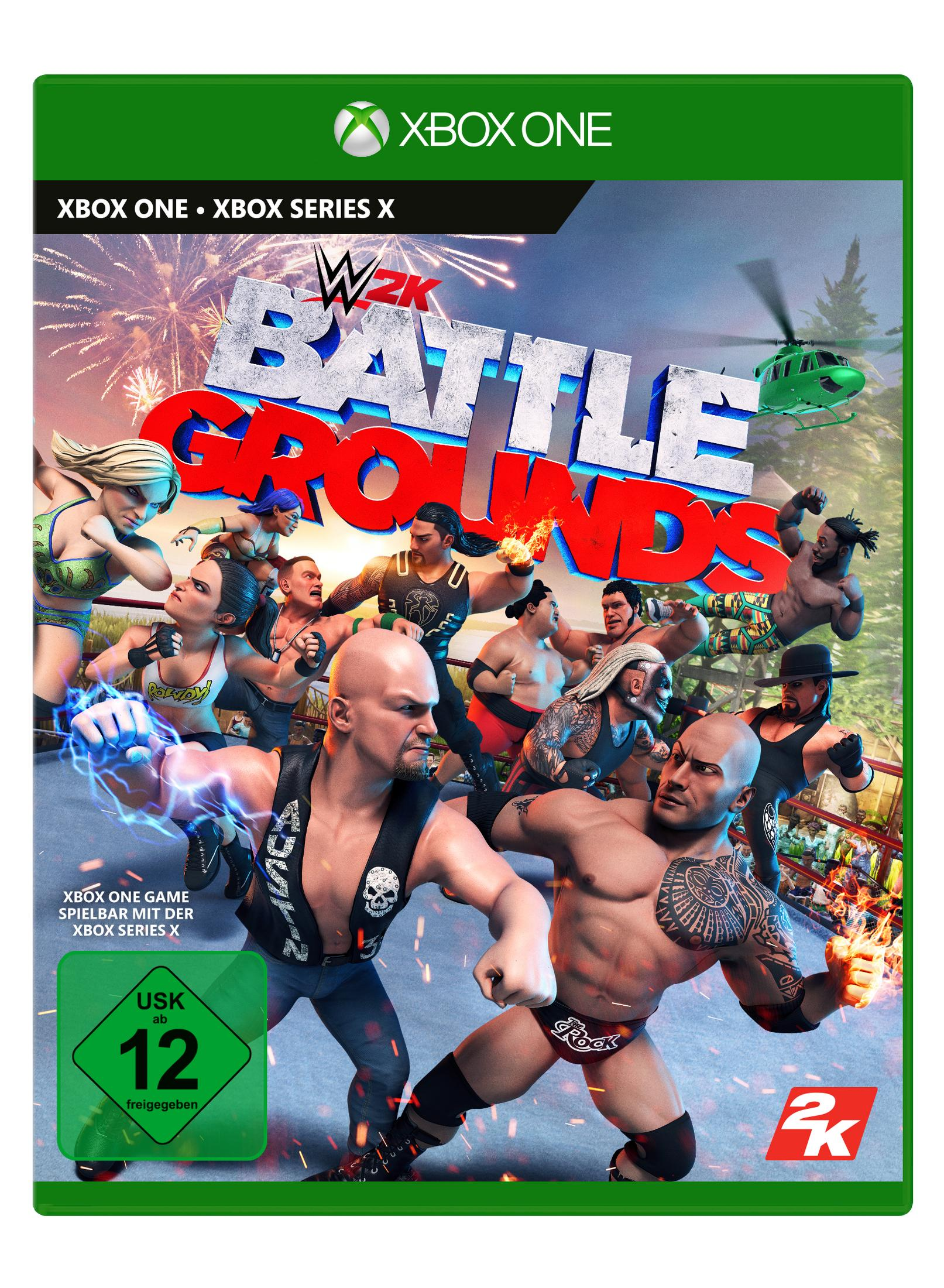 WWE 2K Battlegrounds Spielbox für Xbox One. Actionreiche Szene mit Wrestlern, einem Hubschrauber und Feuerwerk.