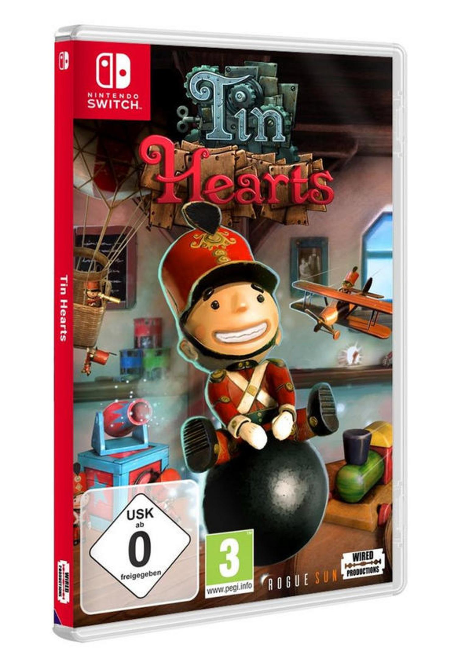 Tin Hearts Spielbox. Spielzeugsoldat auf Kanonenkugel, Hintergrund mit Spielzeug, Nintendo Switch.