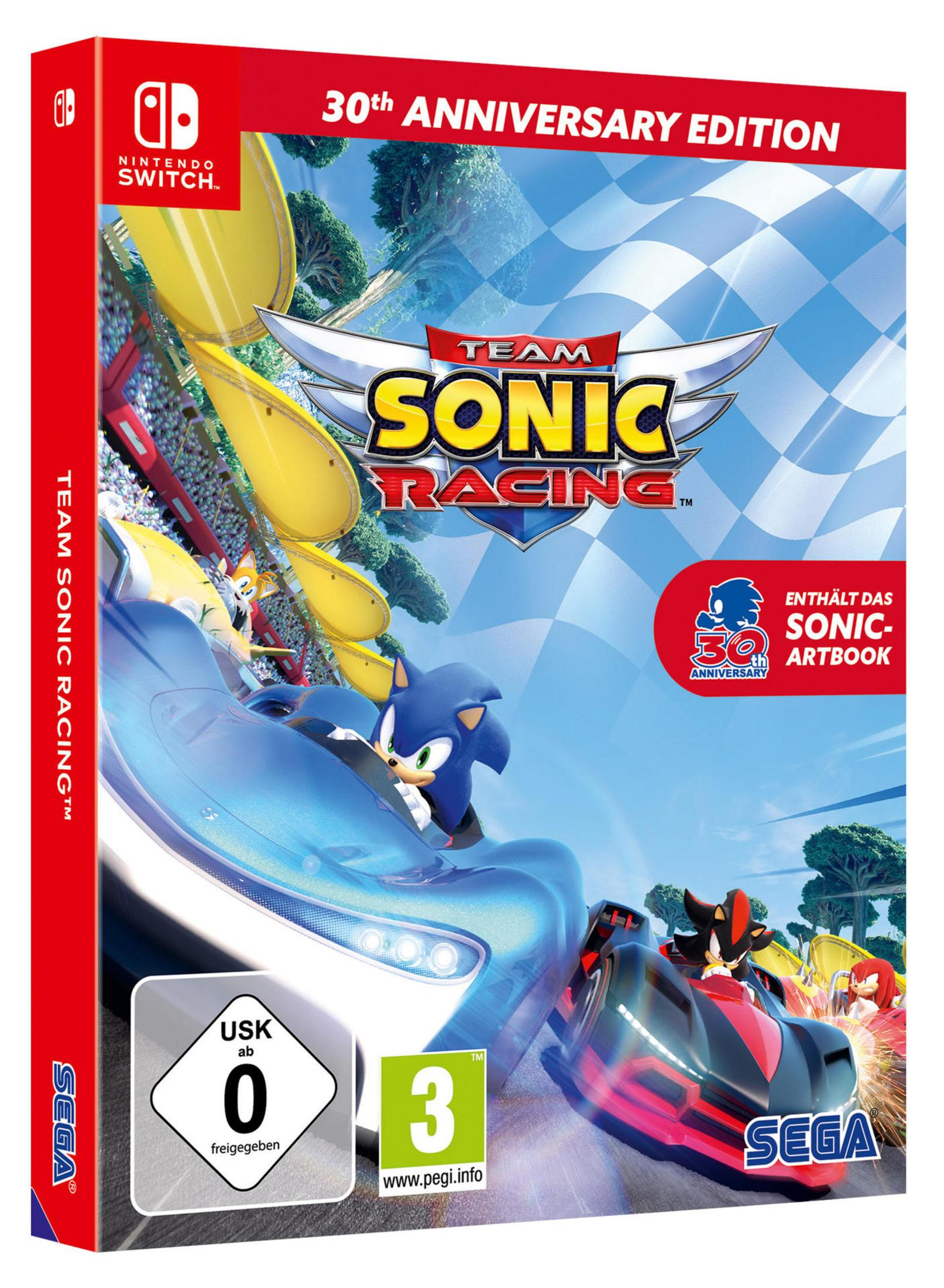 Team Sonic Racing-Spielbox. Sonic in einem blauen Auto, Rennen mit anderen Charakteren auf der Strecke.