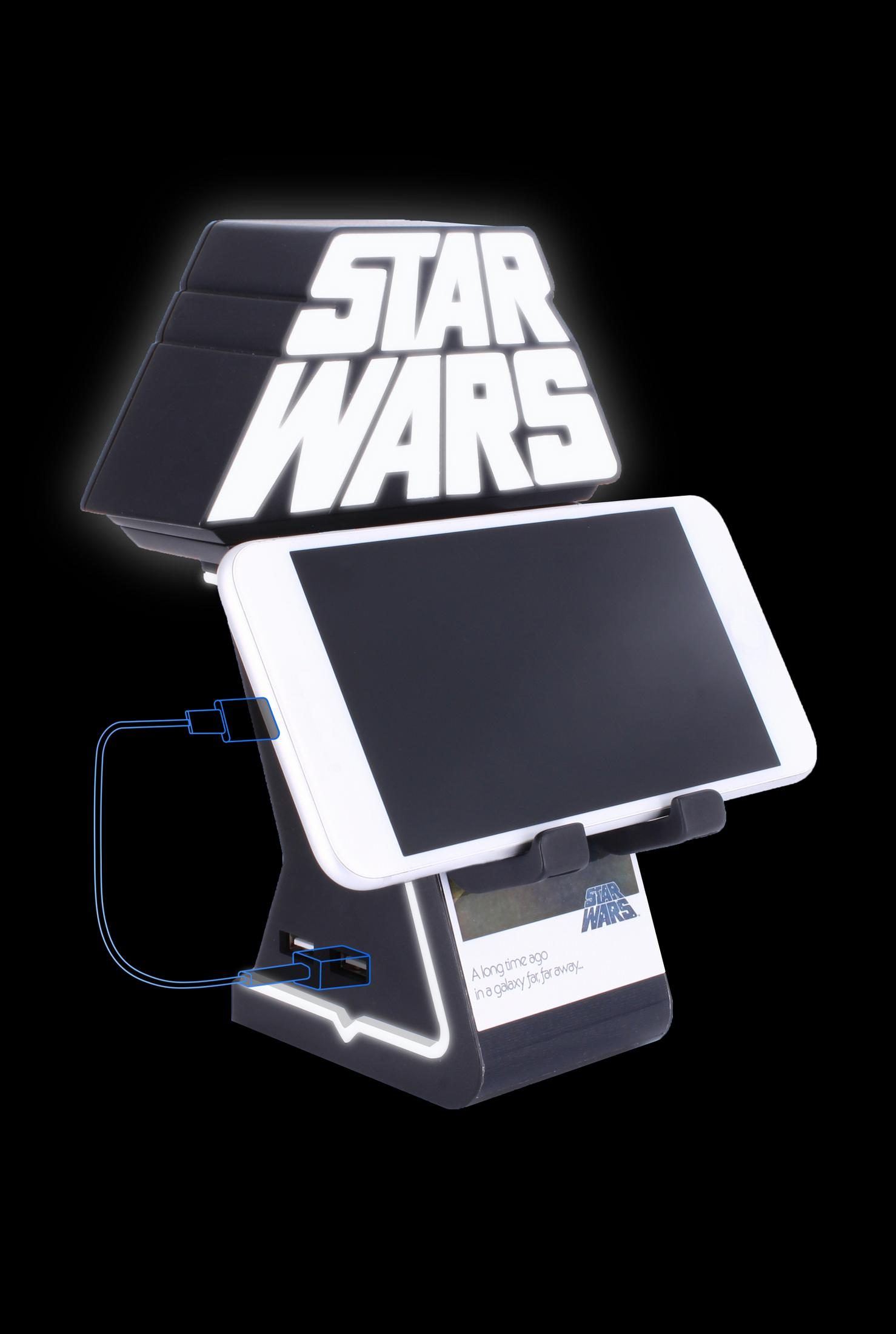 Ein Star Wars Telefonständer mit Tablet, leuchtenden Lichtern und Kabeln.