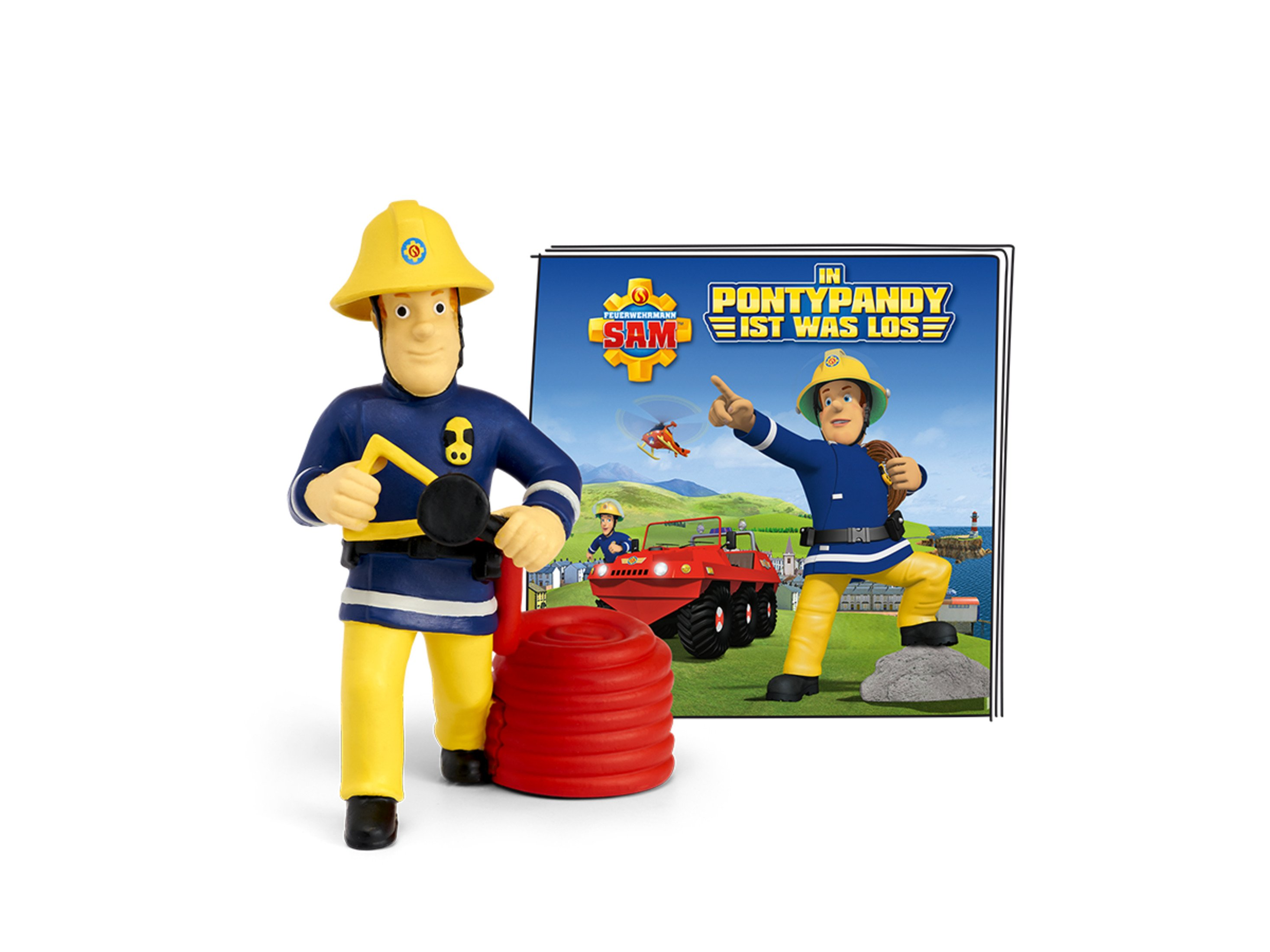 Feuerwehrmann Sam Spielfigur steht mit einem Buchcover, das Feuerwehrmann Sam in Aktion zeigt.