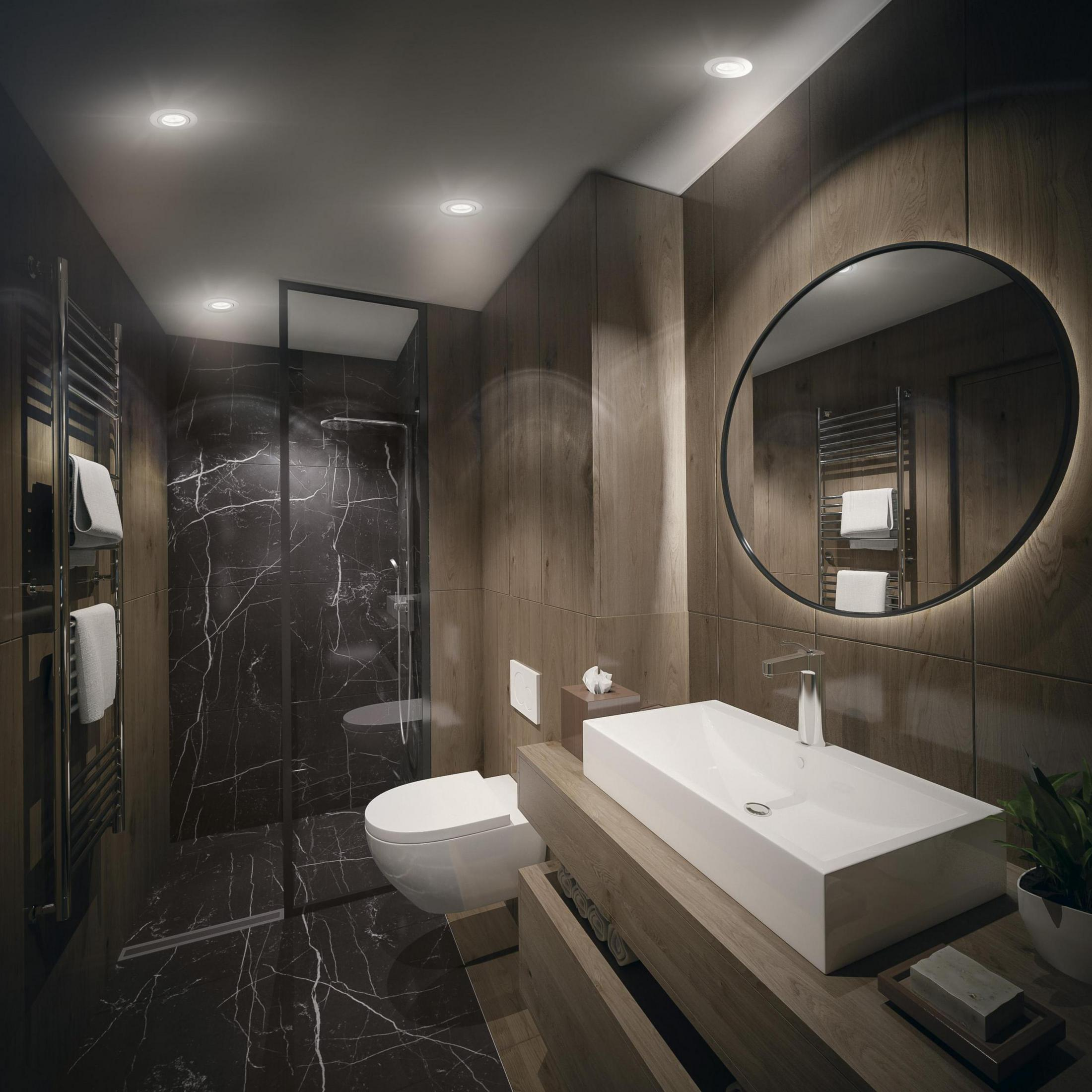 Nowoczesna łazienka z drewnianymi panelami, marmurową podłogą, umywalką, okrągłym lustrem, prysznicem i wbudowanymi światłami.