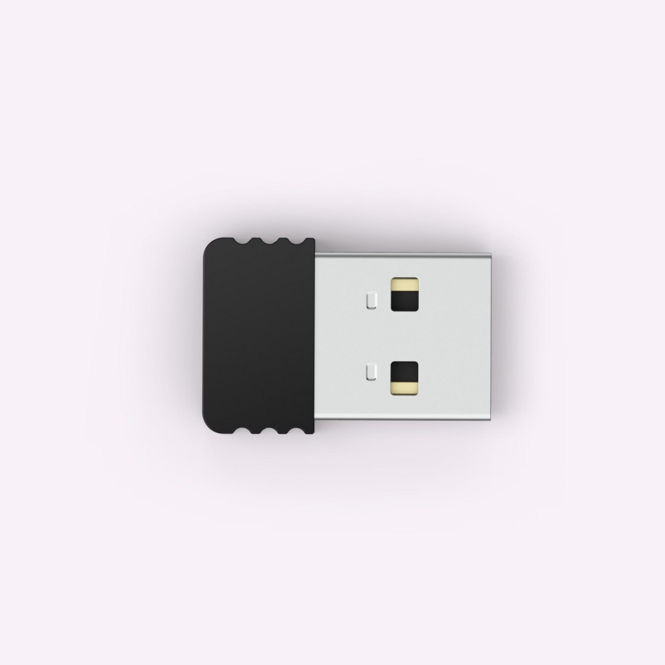 Chiavetta USB nera su sfondo rosa. L'unità è posizionata al centro.