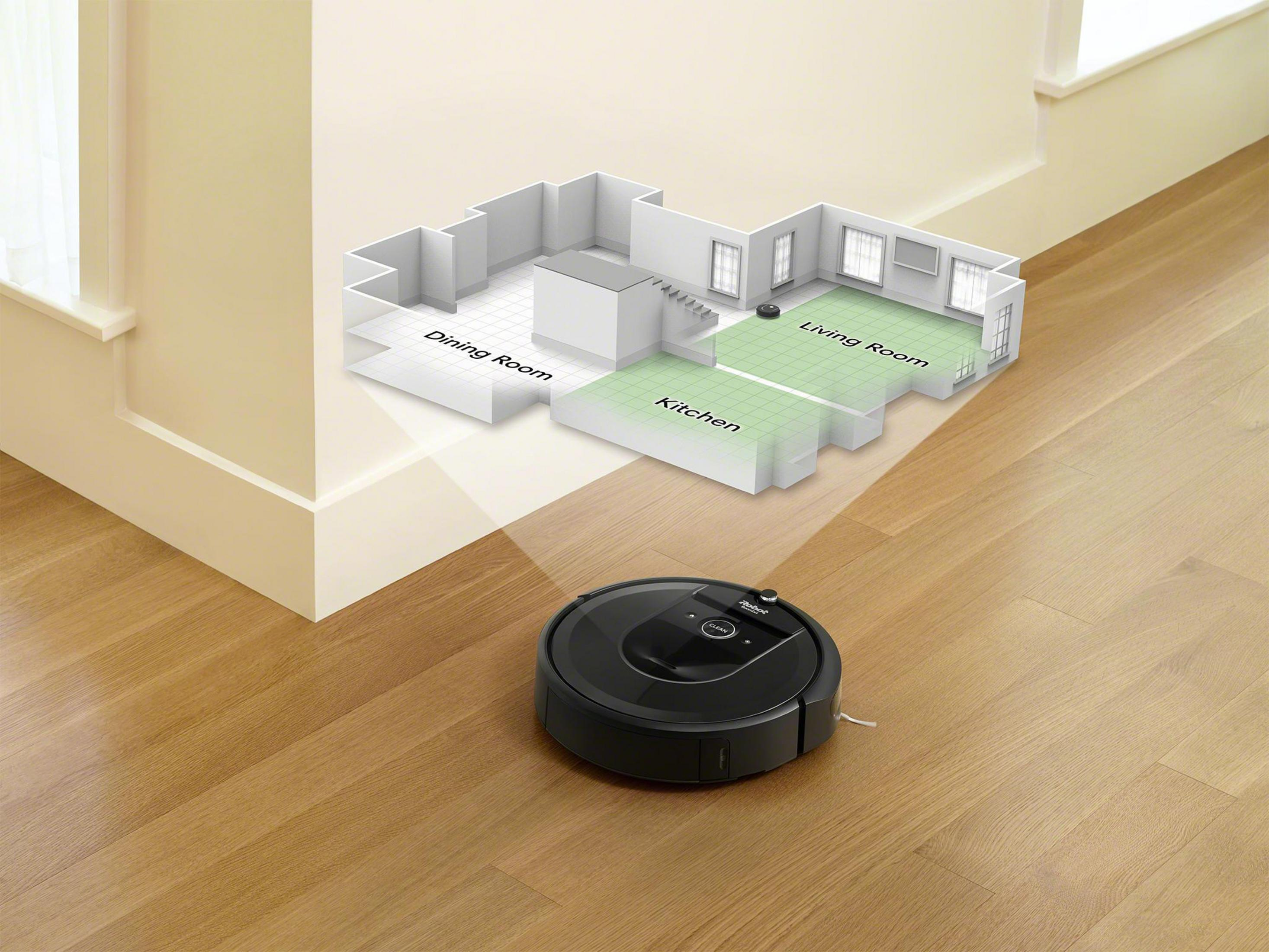 Ein Roboter-Staubsauger reinigt ein Haus, mit einer Grundrissüberlagerung.