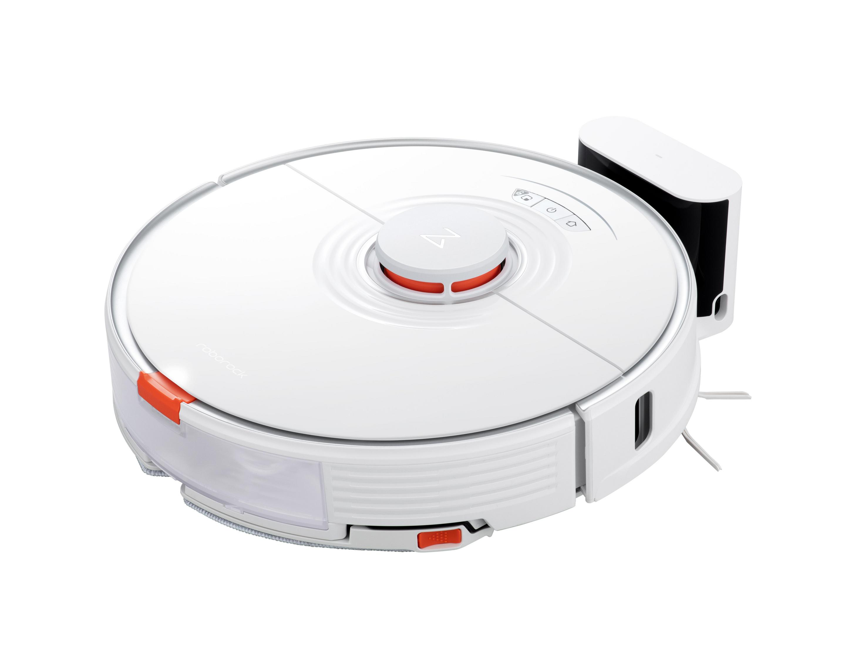 A white round robot vacuum cleaner next to its charging dock on a white background.