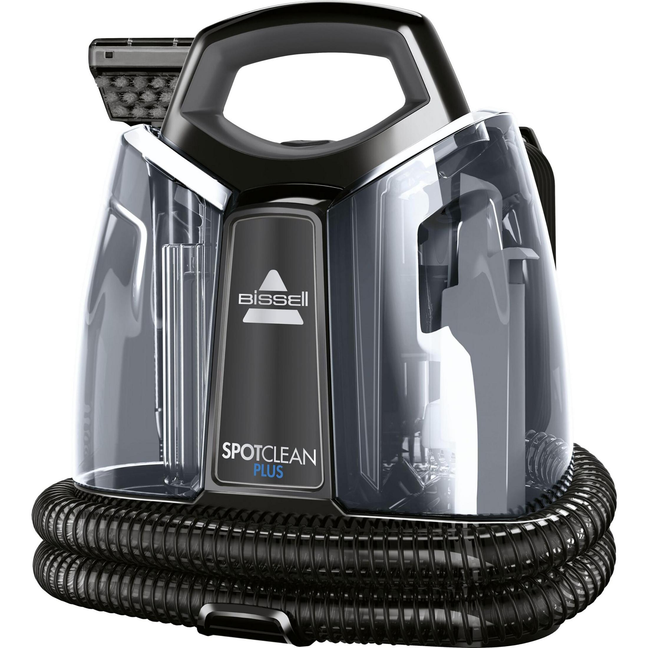 Black Bissell SpotClean Plus, a portable carpet cleaner with a hose and water tanks.
