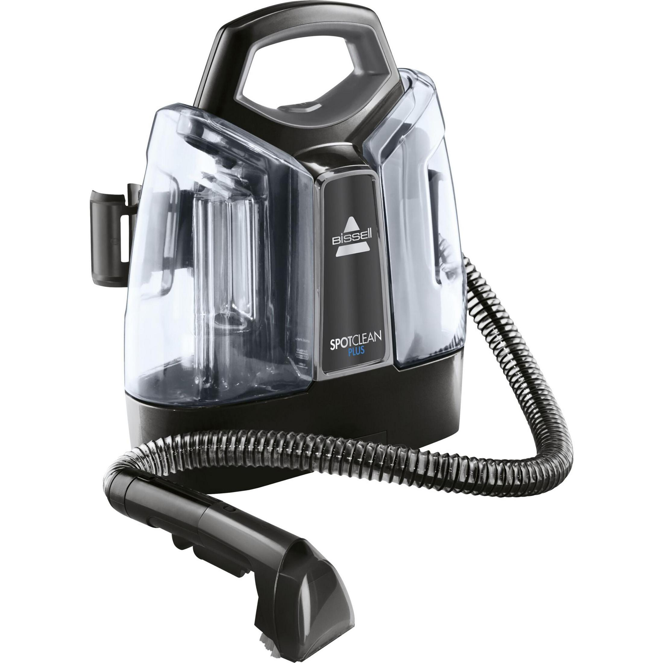 Black Bissell SpotClean Plus portable carpet cleaner. Black hose and nozzle. White background.