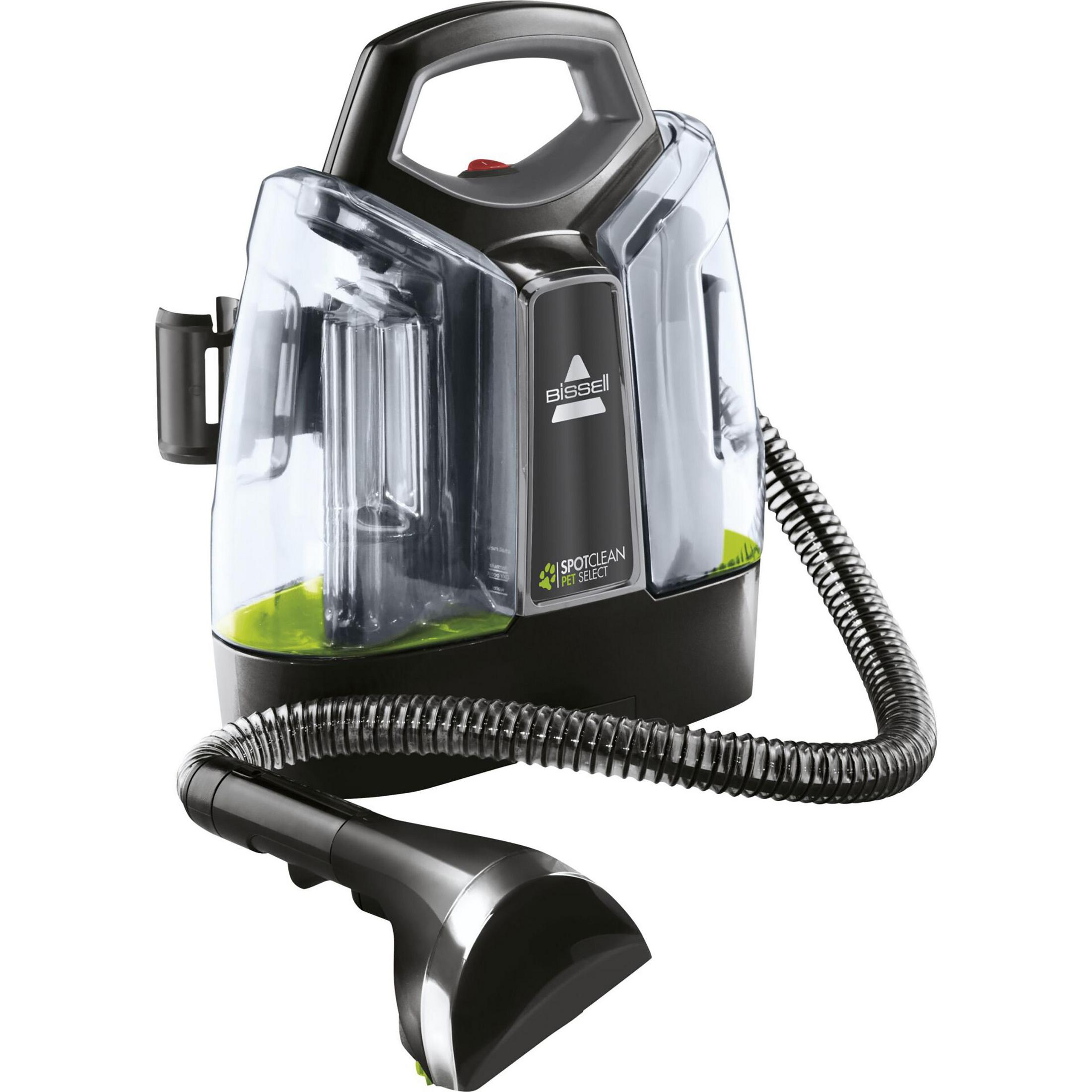 Bissell SpotClean negro y transparente. Tiene un asa y una manguera con cabezal de limpieza.
