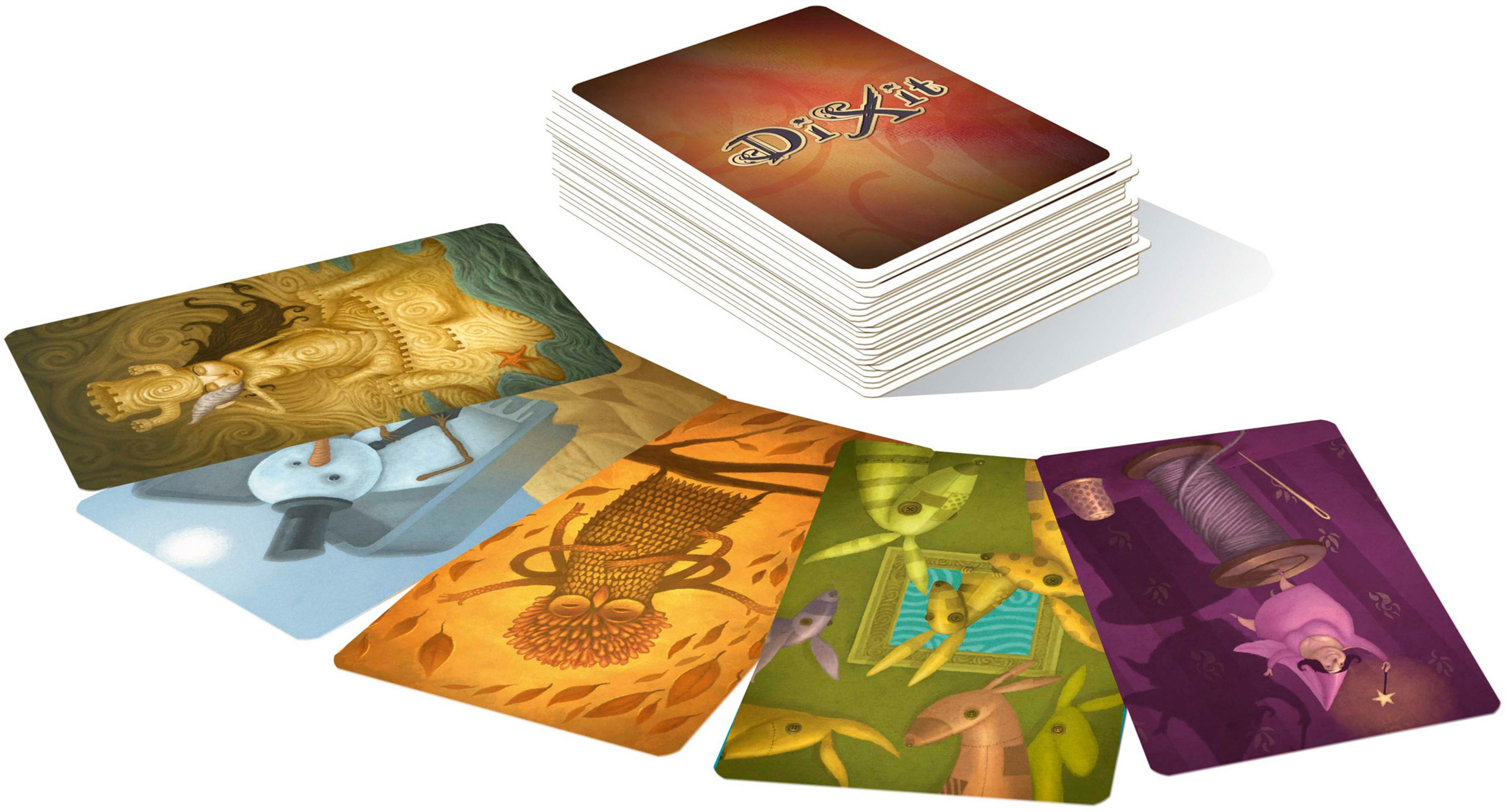 Gra karciana Dixit. Karty z artystycznymi ilustracjami. Stos kart. Kolorowe i pomysłowe obrazy.