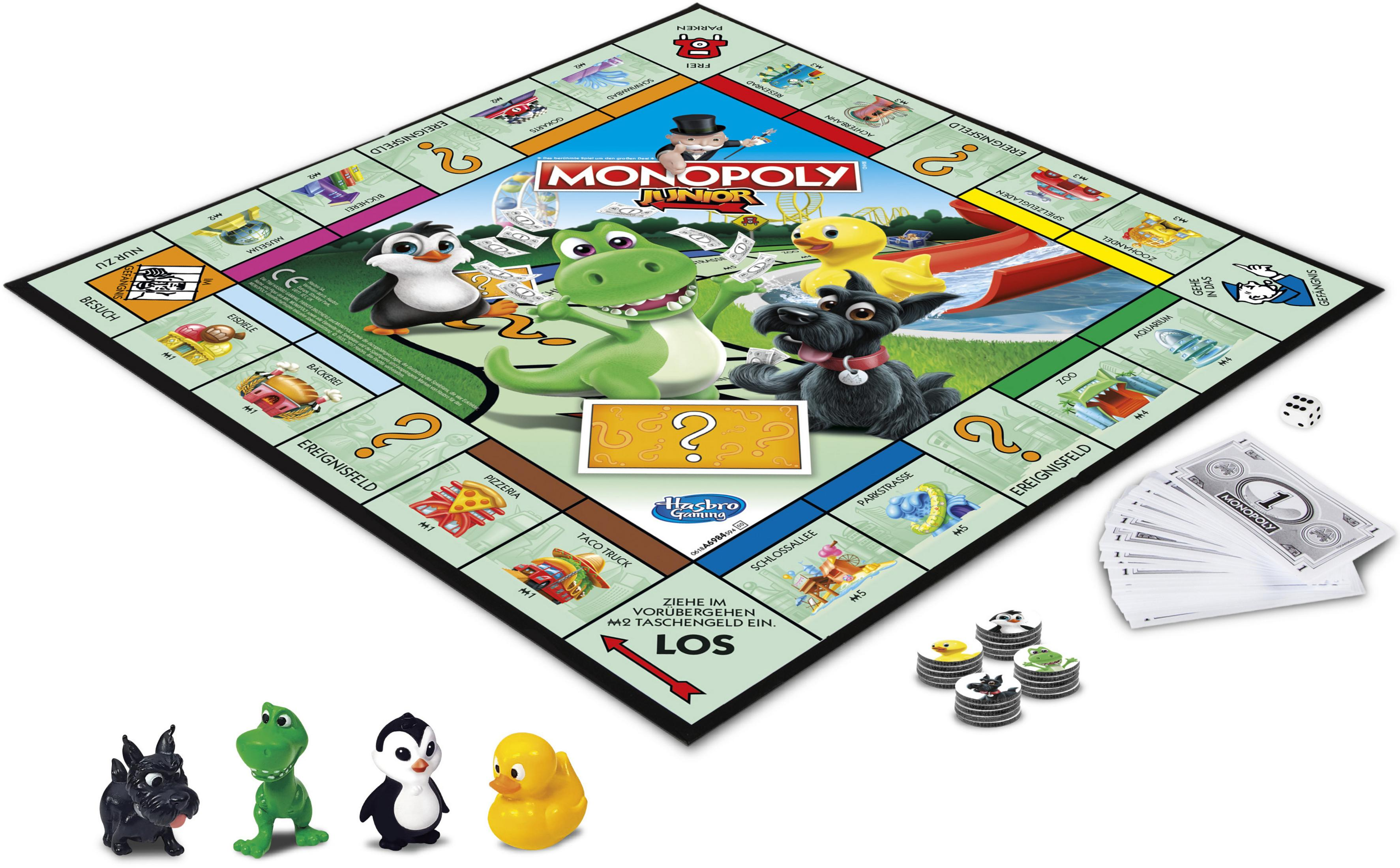 Un juego de mesa Monopoly Junior configurado con piezas de juego y cartas.