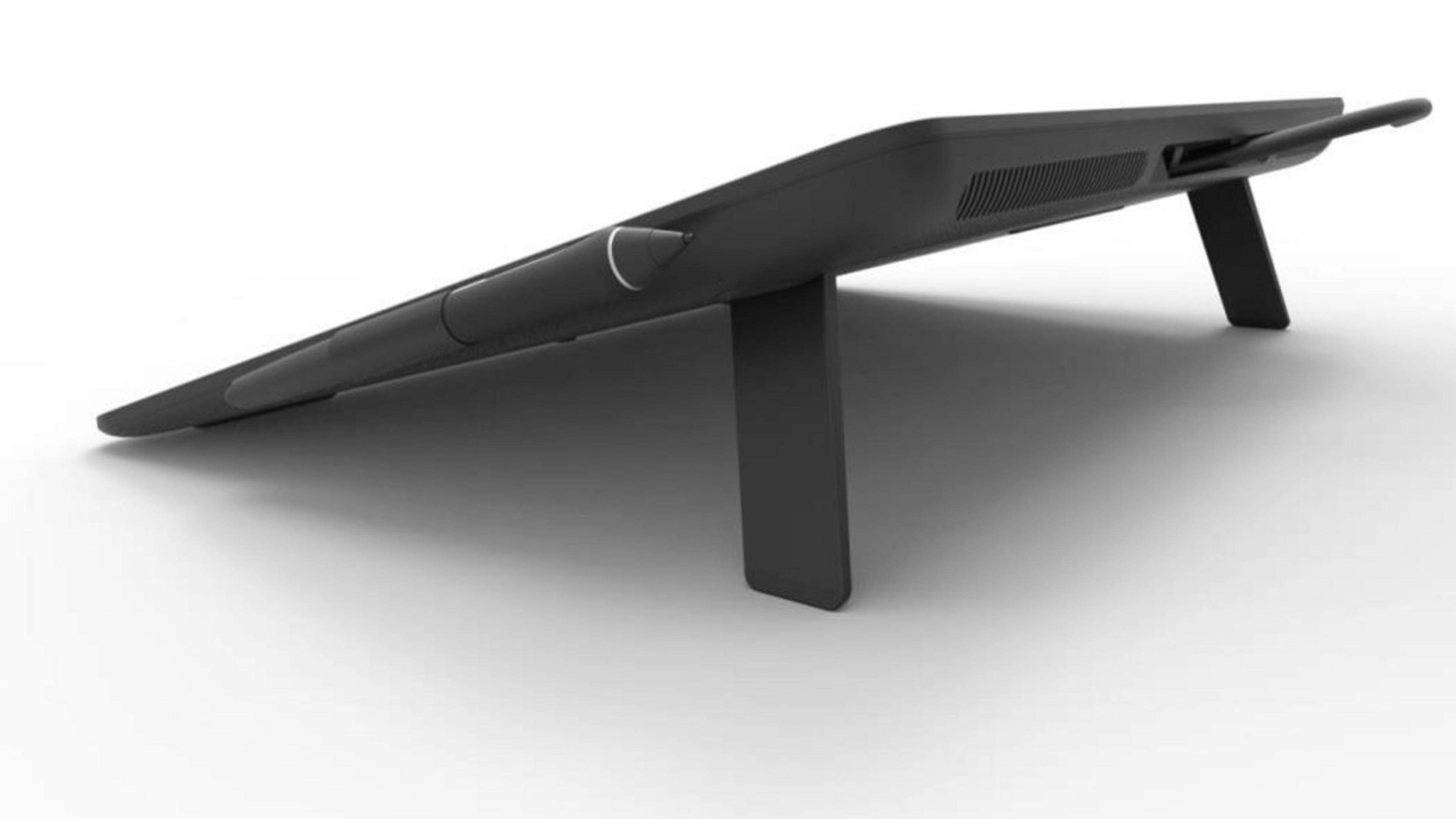 Una tableta negra apoyada en un soporte. La tableta está en ángulo y tiene un bolígrafo.