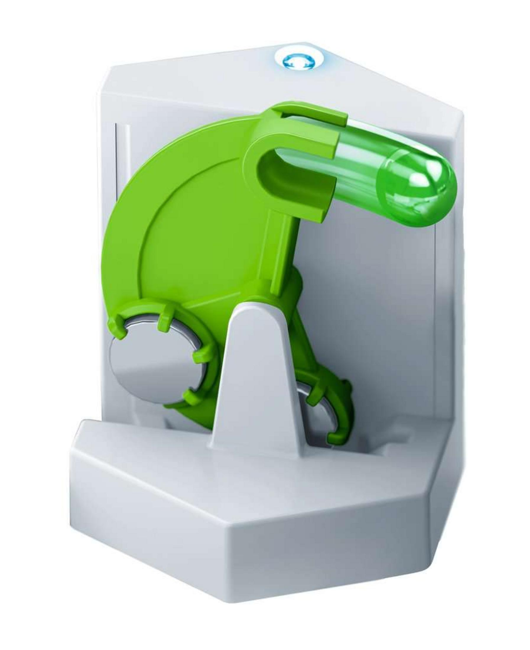 Giocattolo verde e bianco con un tubo trasparente. È un giocattolo per bambini.
