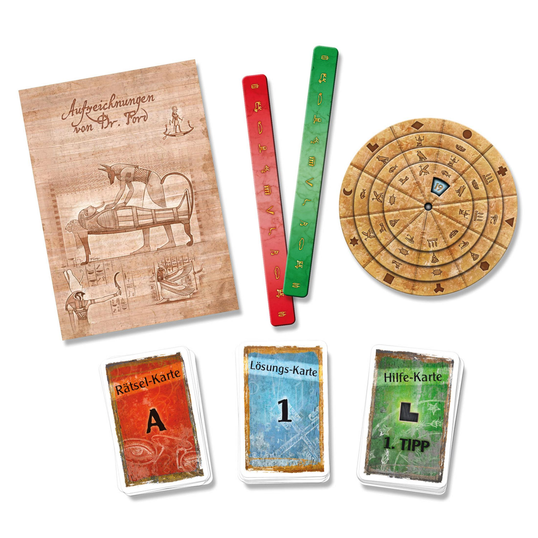 Spielkomponenten: Rätselkarten, Lösungskarten und ein kreisförmiges Holzstück werden angezeigt.