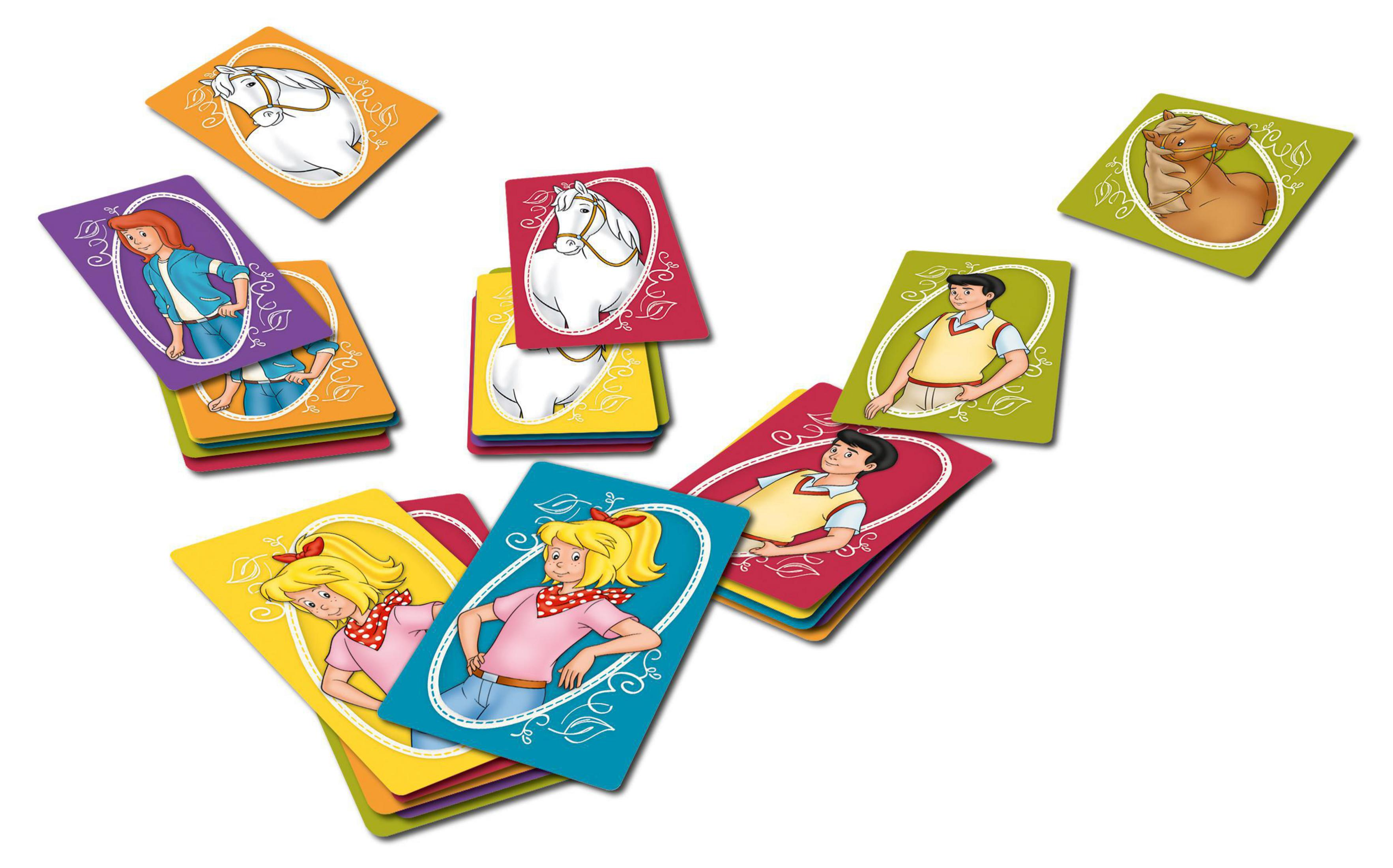 Spielkarten mit Menschen und Pferden, verstreut auf weißem Untergrund.