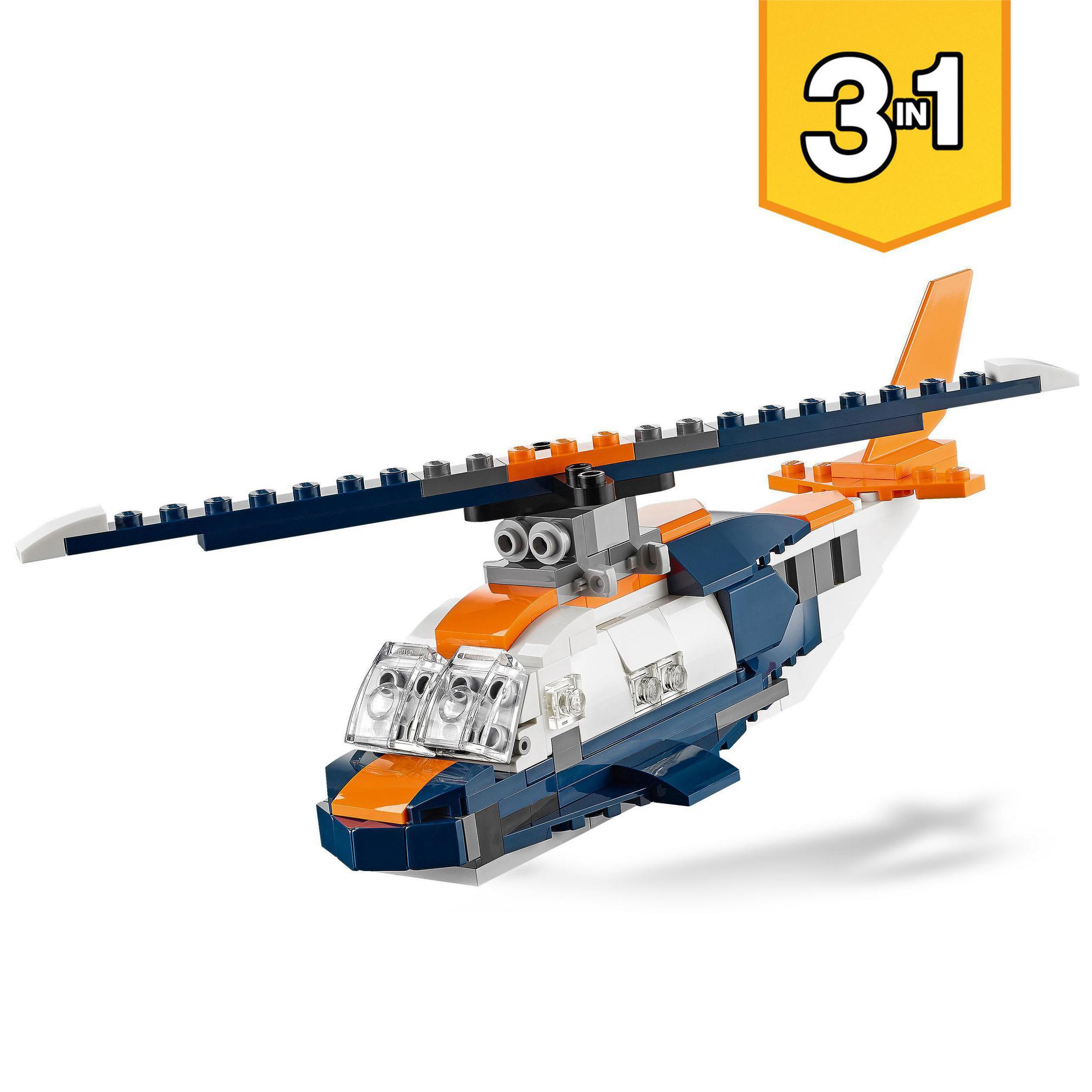 Un helicóptero Lego blanco, azul y naranja con un logo 3 en 1.