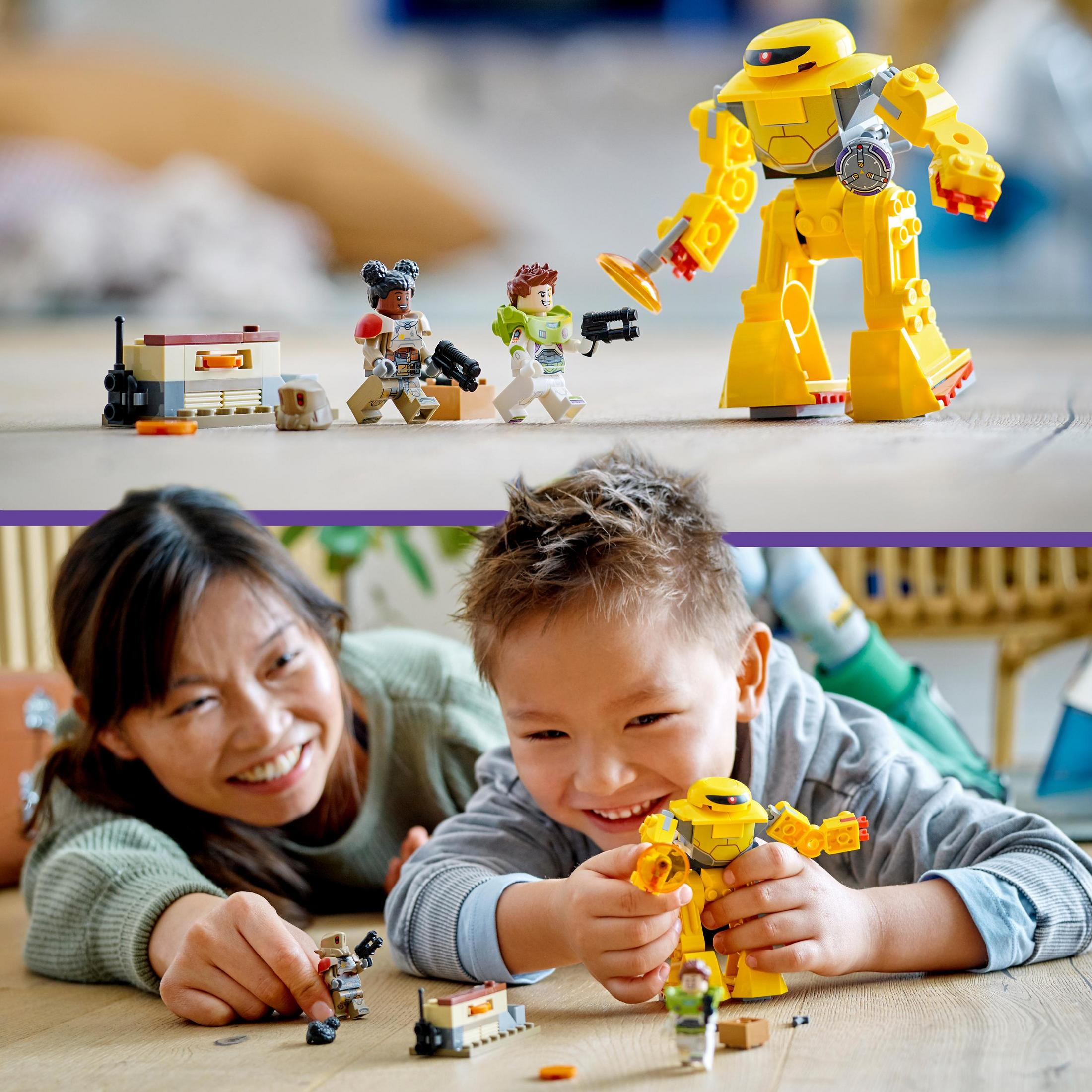 LEGO-Set mit Roboter und Minifiguren. Eine Frau und ein Junge bauen den Roboter zusammen. Spielzeug auf dem Boden.