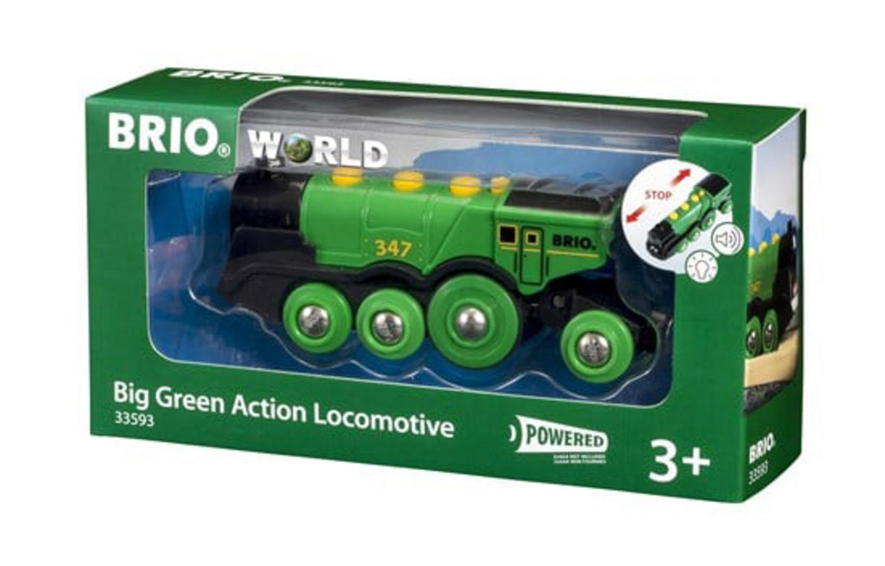 Grüne Spielzeuglokomotive in einer Box, mit den Worten 'Big Green Action Locomotive'.