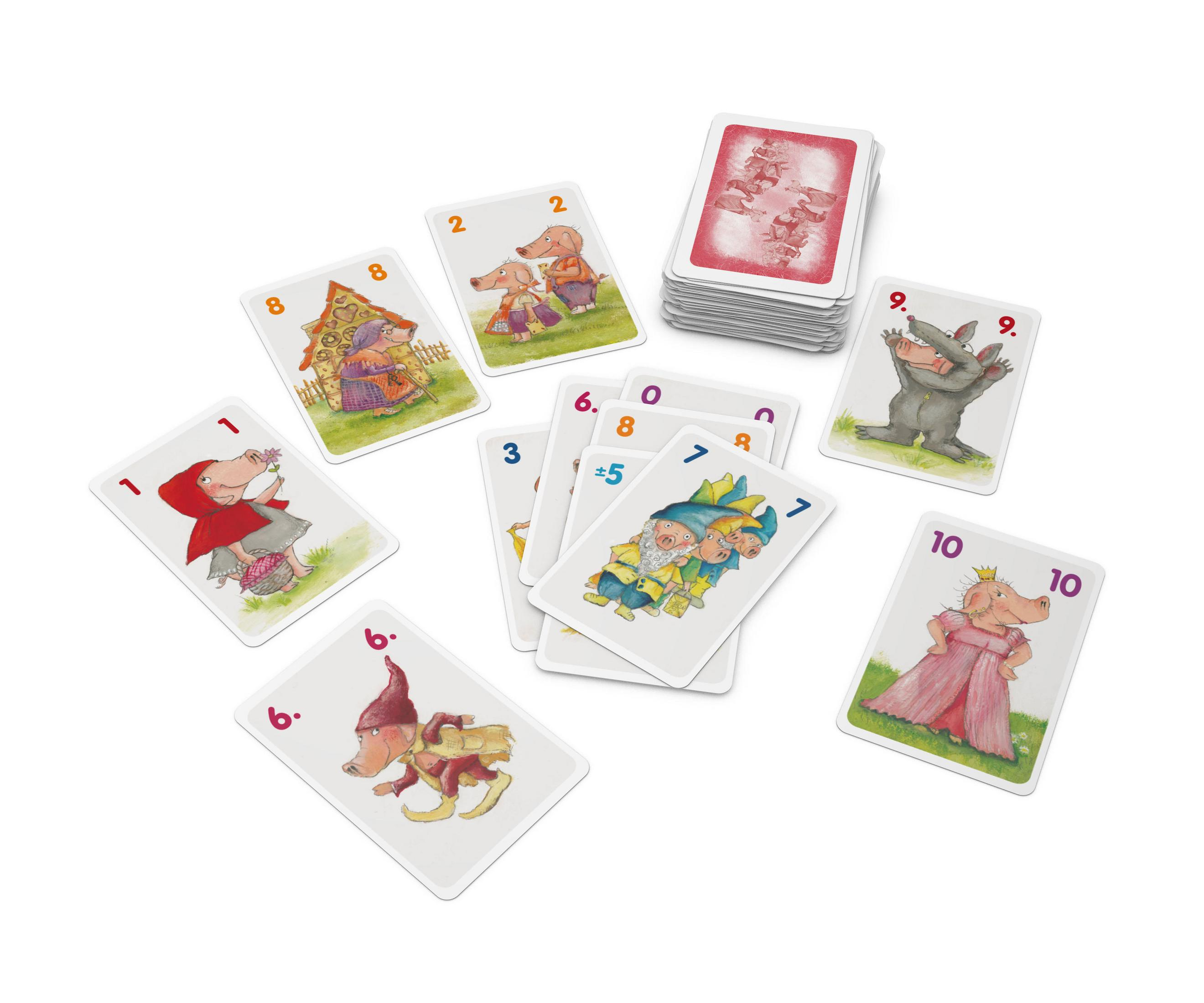 Ein Kinderspiel mit verschiedenen Märchenfiguren auf den Karten, angeordnet auf einer weißen Oberfläche.