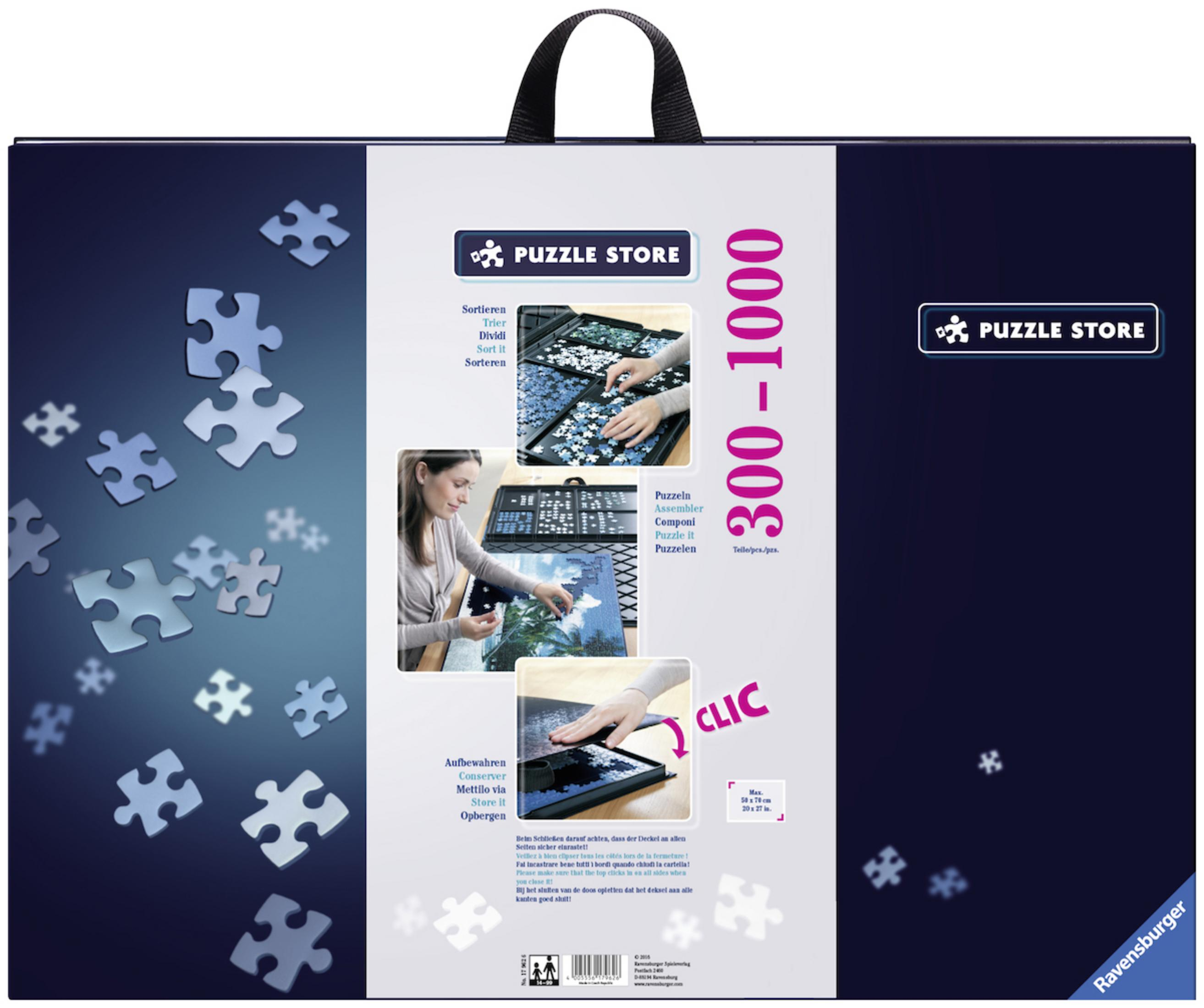 Puzzle Store Box mit einer Frau, die Puzzles zusammensetzt, und verstreuten Puzzleteilen.