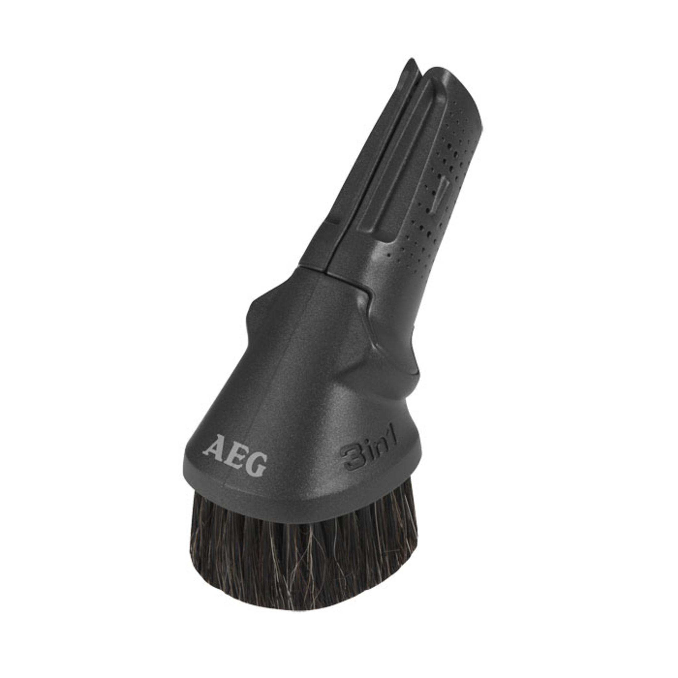 Cabezal de cepillo de aspiradora negro con el texto "AEG 3in1".