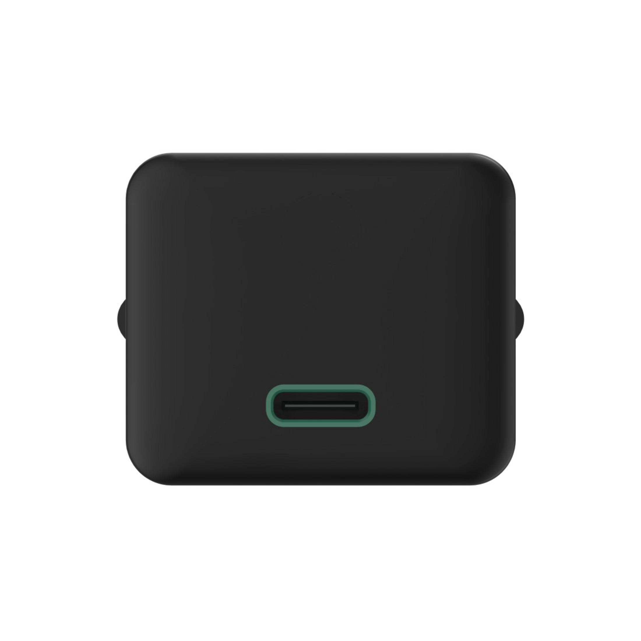 Kwadratowe czarne urządzenie z zielonym portem.