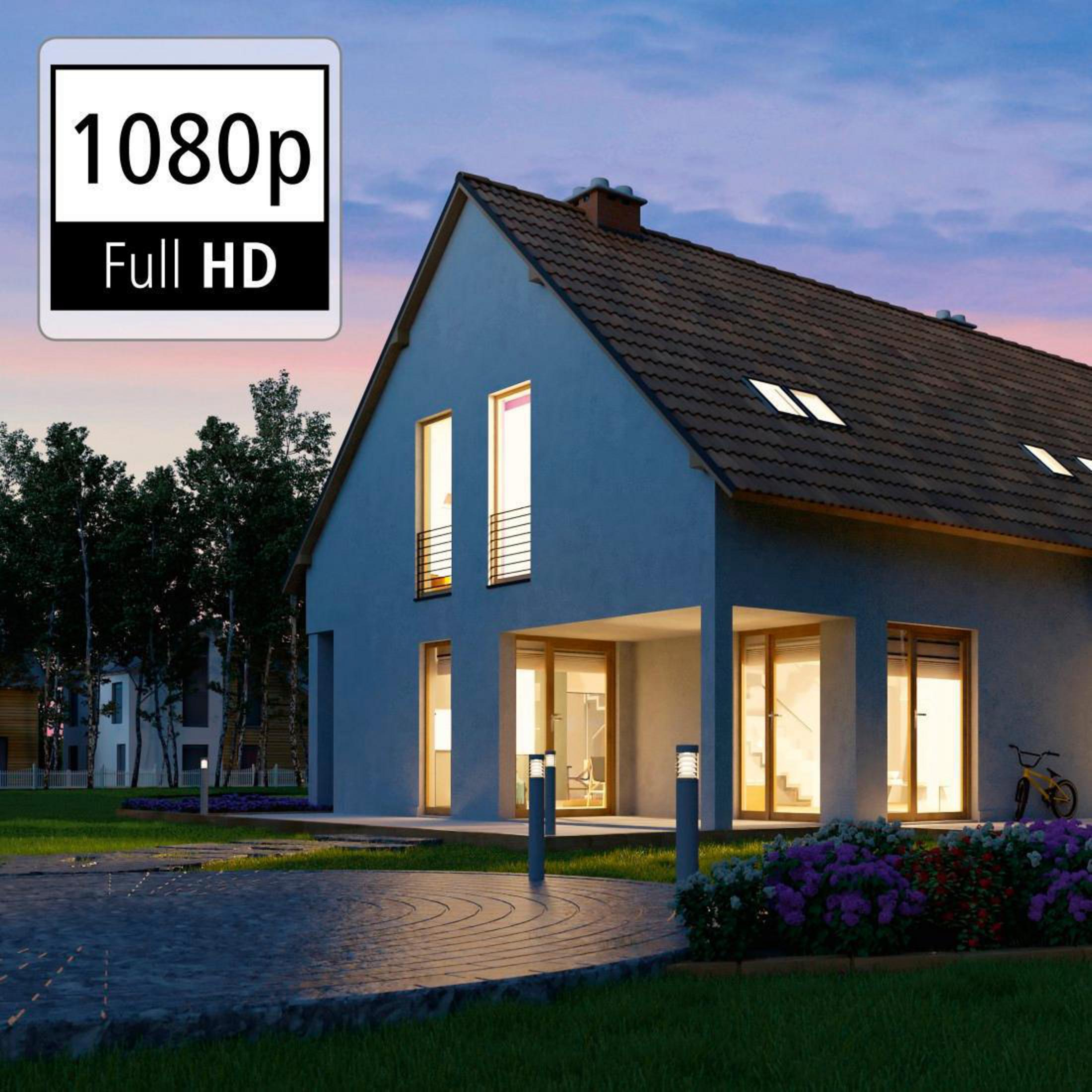 Außenansicht eines modernen Hauses in der Abenddämmerung, mit Lichtern und einem Schild mit 1080p Full HD.