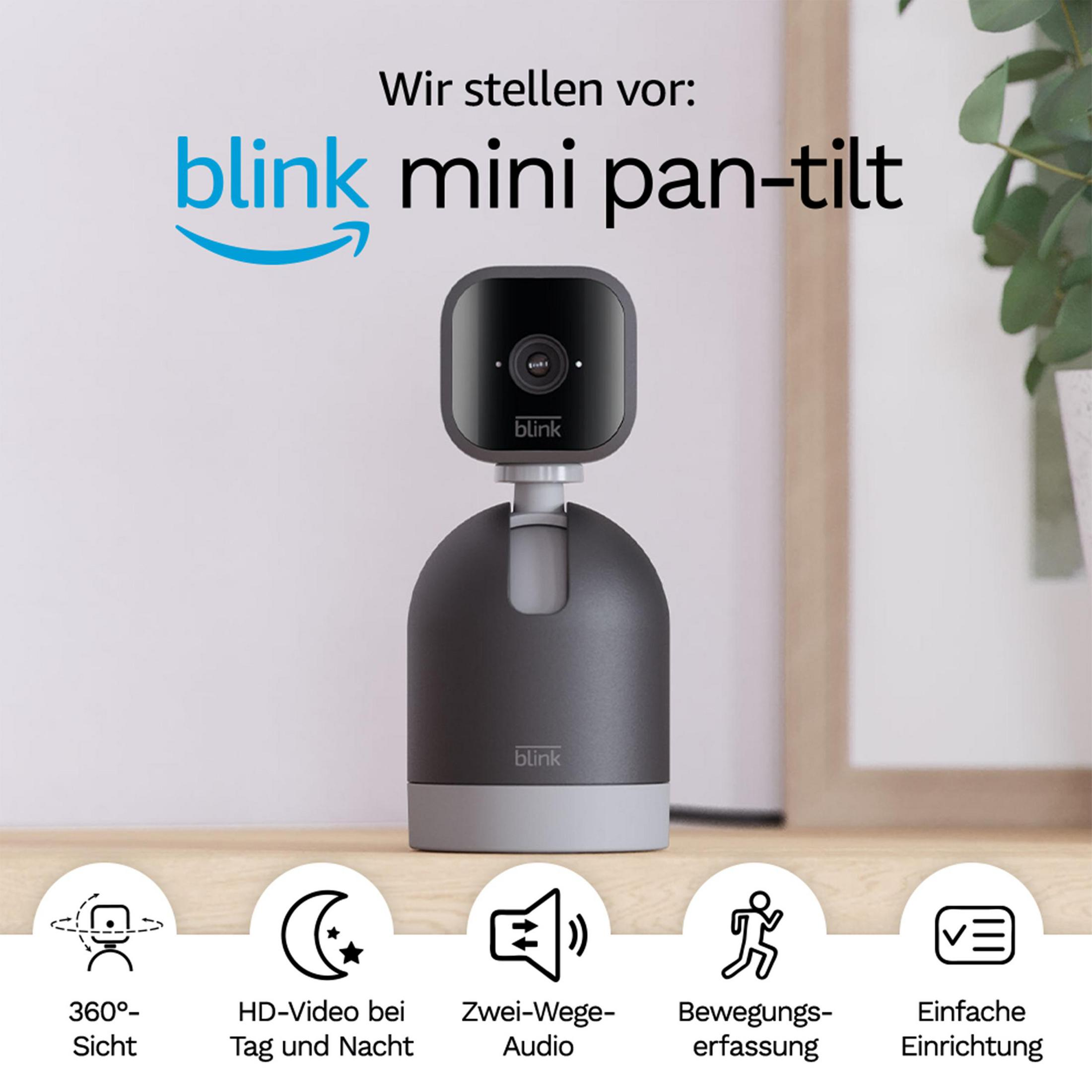 Czarna kamera bezpieczeństwa na stojaku z ikonami poniżej. U góry napisano 'blink mini pan-tilt'. Jest na drewnianym stole.
