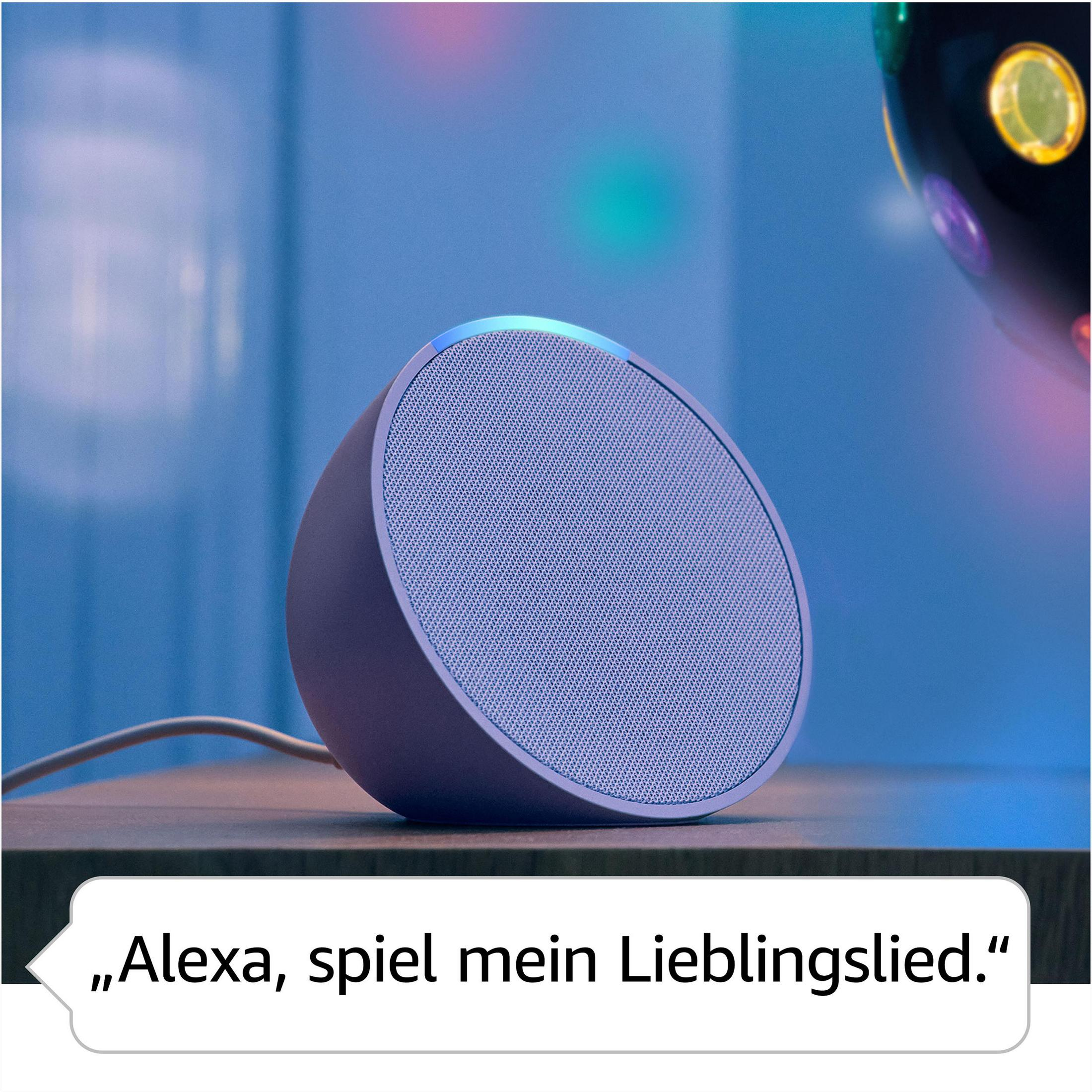 Mały, kątowy głośnik z niebieską maskownicą. Dymek: Alexa, odtwórz moją ulubioną piosenkę.
