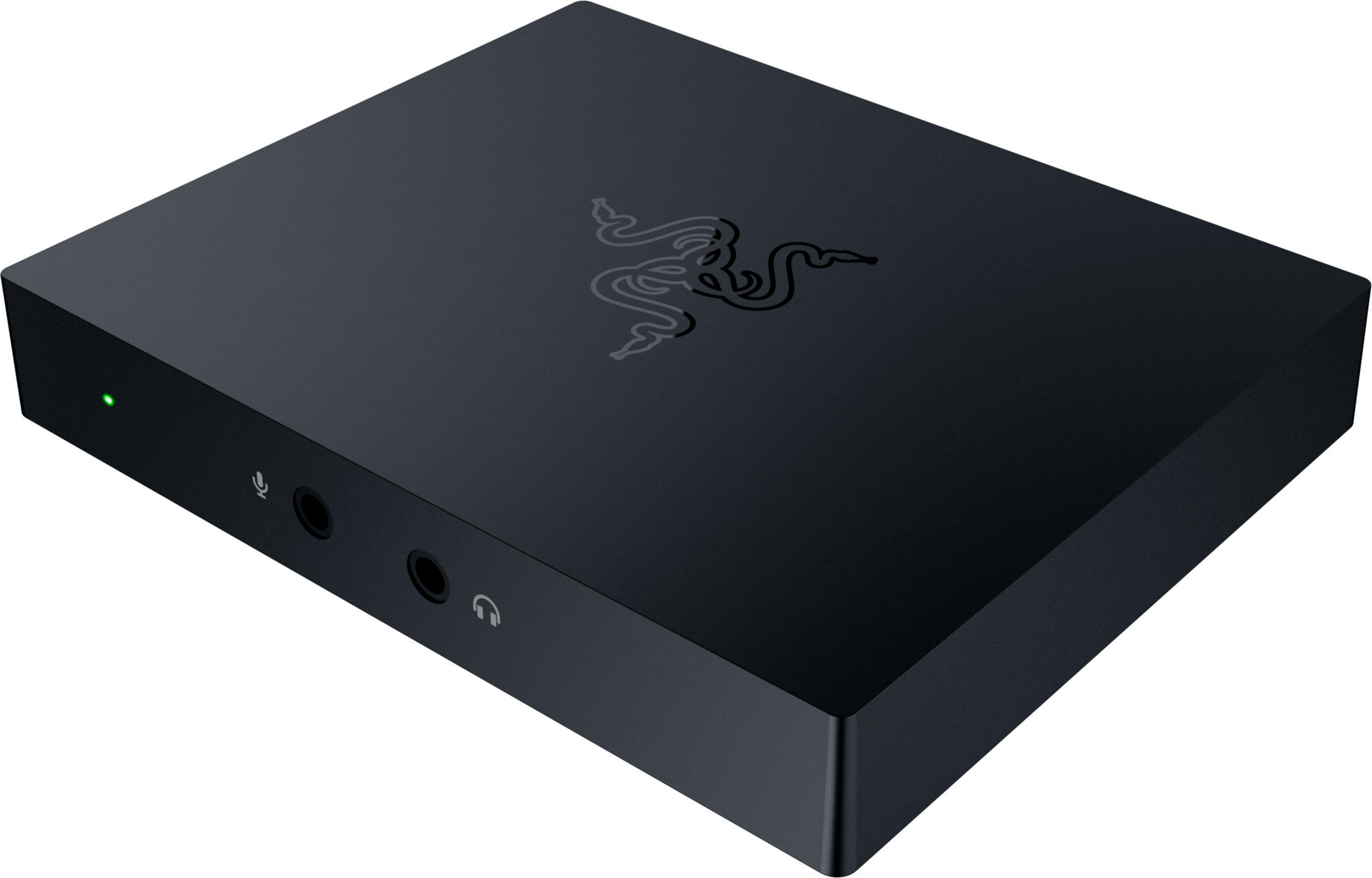 Dispositivo Razer negro con el logotipo de Razer. Tiene puertos de entrada y salida.