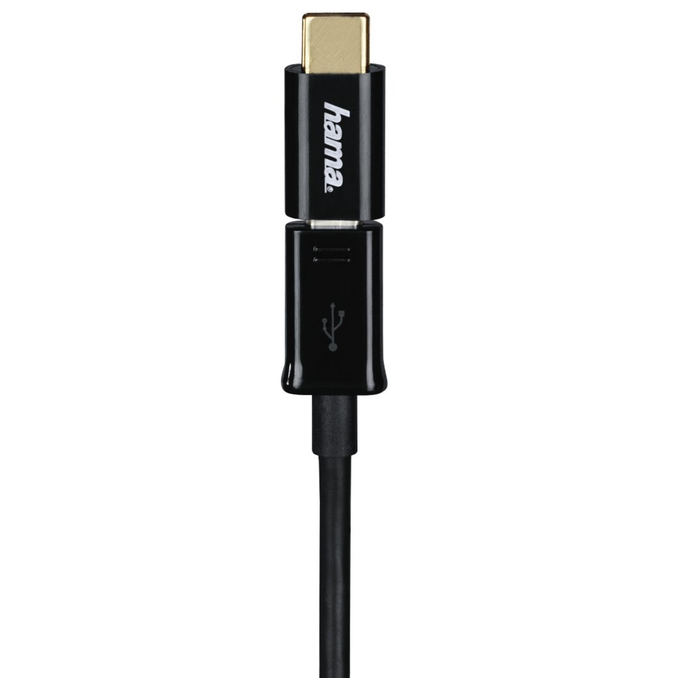 Czarny adapter USB-C na USB. Jeden koniec to USB-C, drugi to standardowe USB. Czarny kabel.